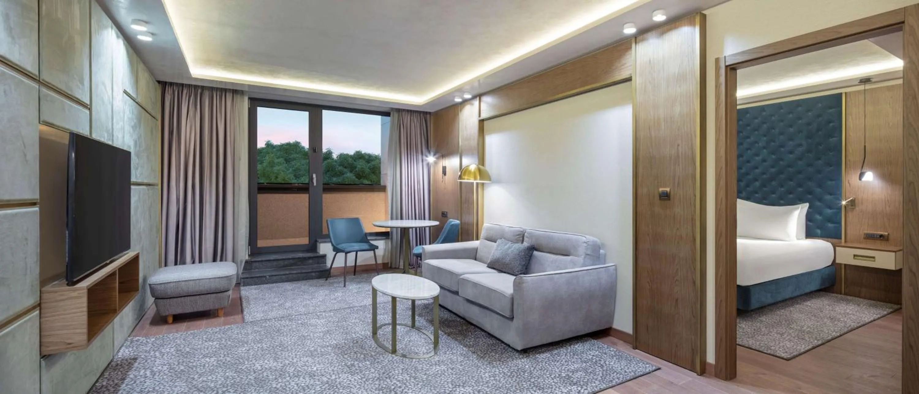 Living room, Bed in Doubletree By Hilton Plovdiv Center