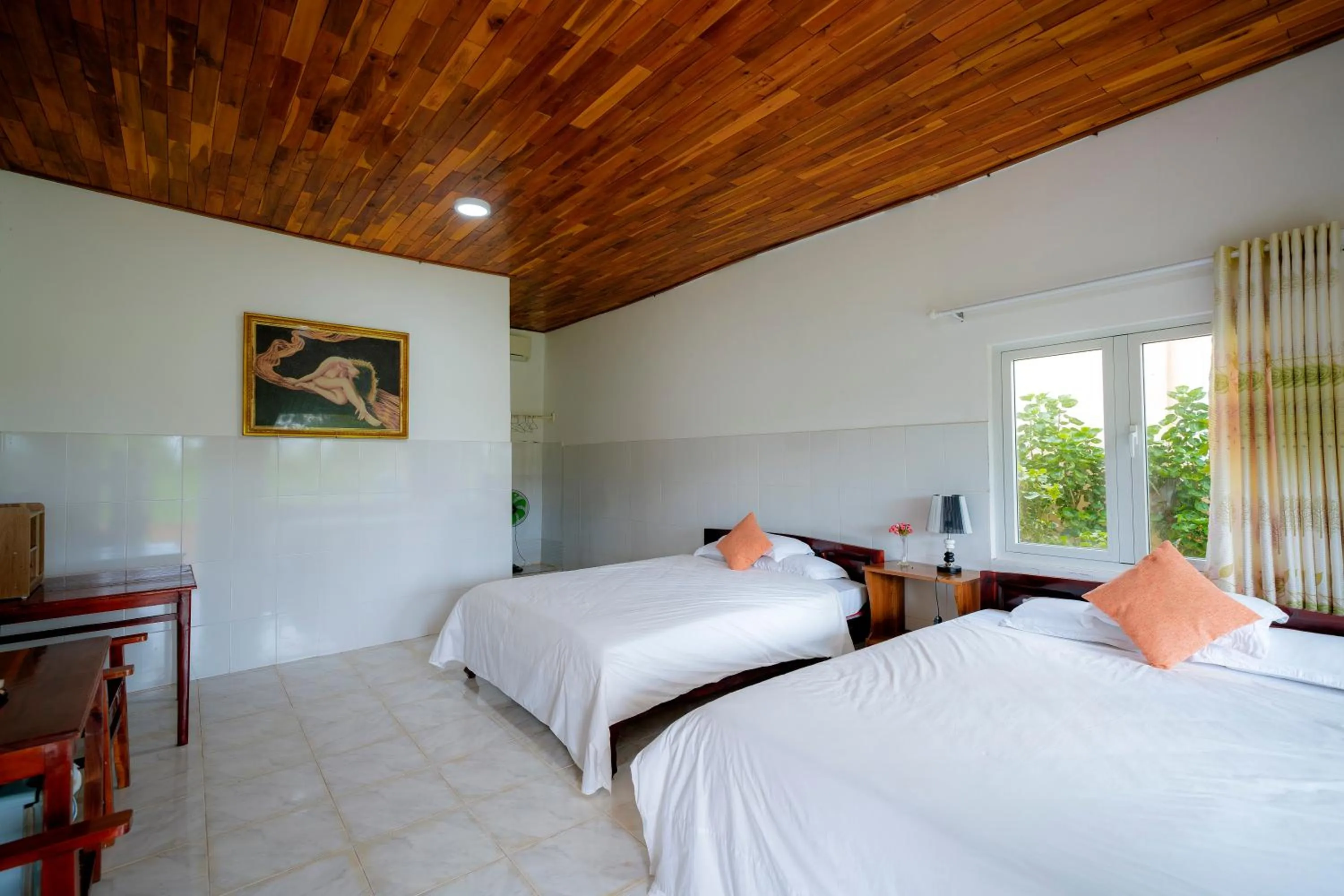 Bed in Thai Tan Tien Hotel