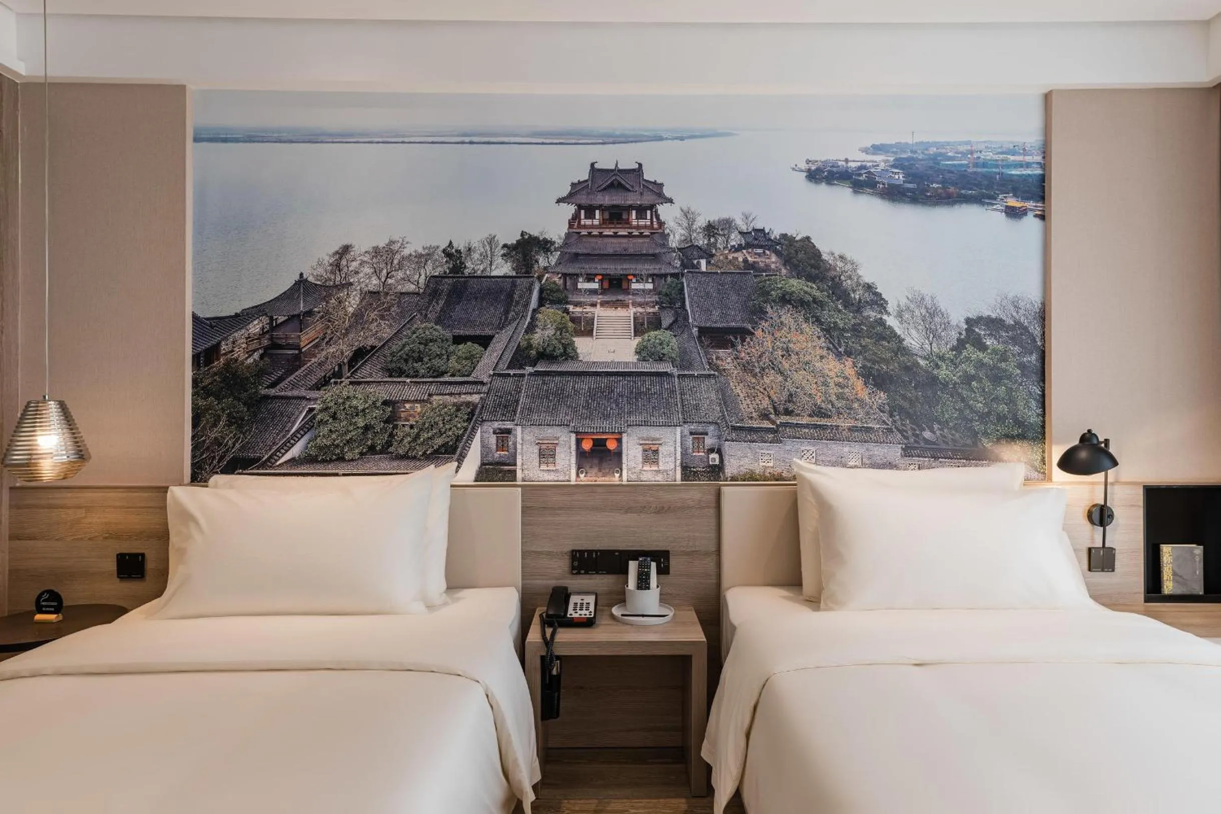 Bed in Atour Hotel Zhenjiang Xijindu Jinshan Temple