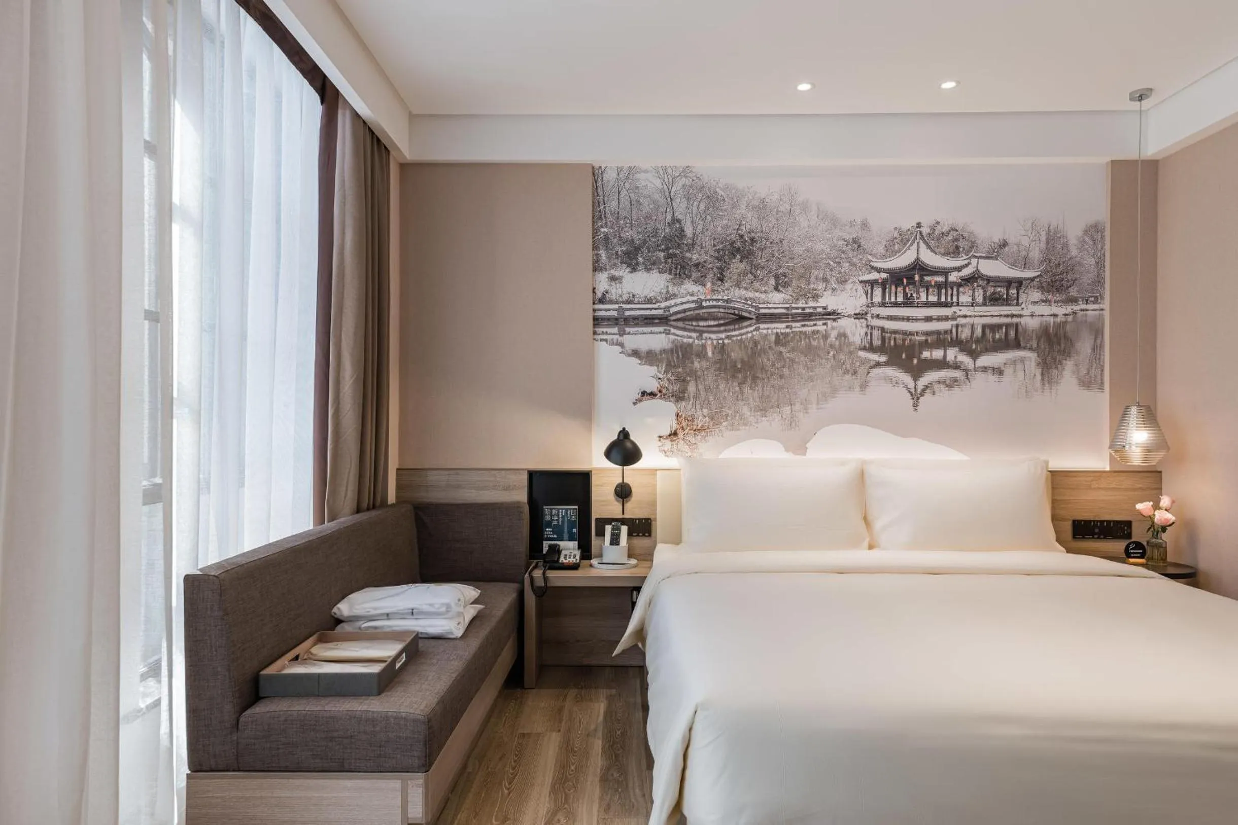 Bed in Atour Hotel Zhenjiang Xijindu Jinshan Temple