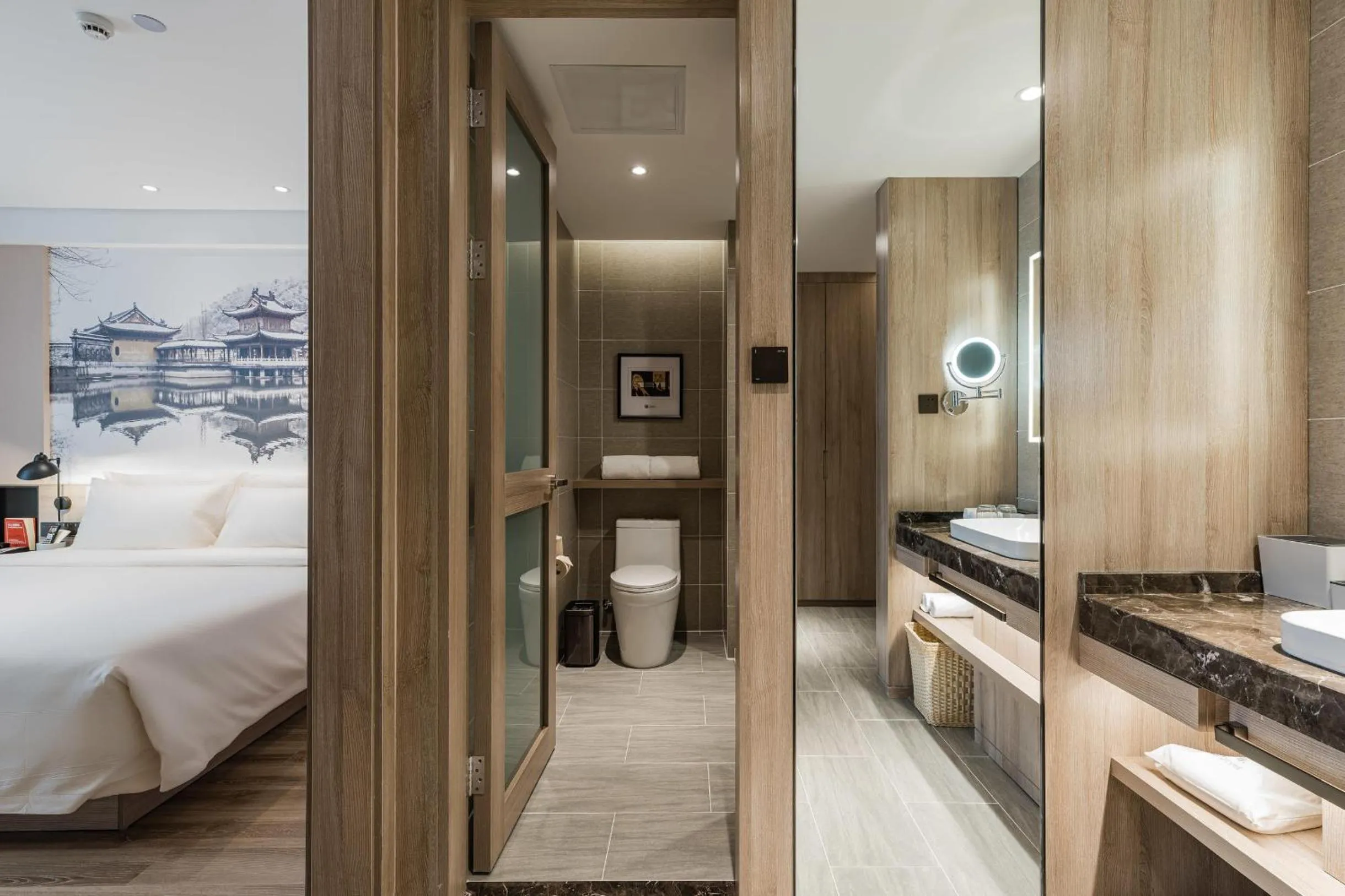 Bed in Atour Hotel Zhenjiang Xijindu Jinshan Temple