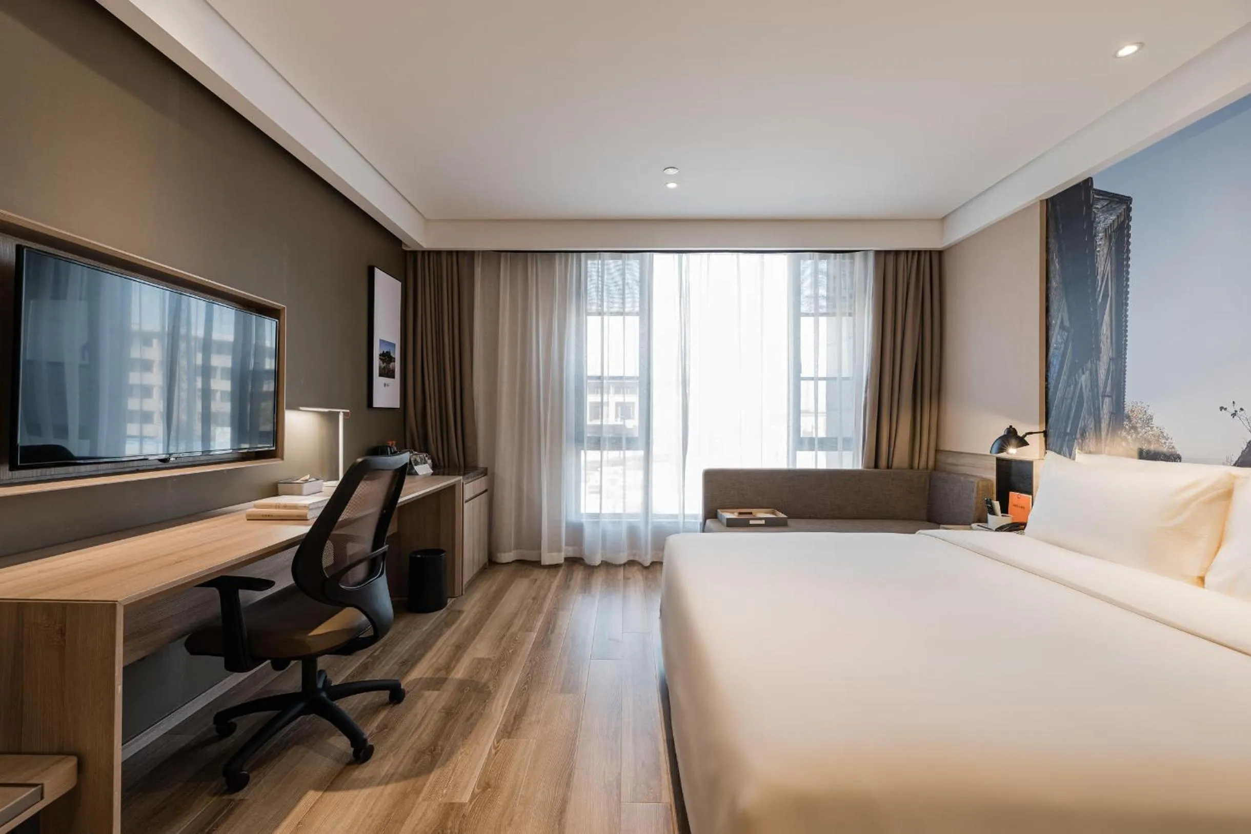 Bed in Atour Hotel Zhenjiang Xijindu Jinshan Temple