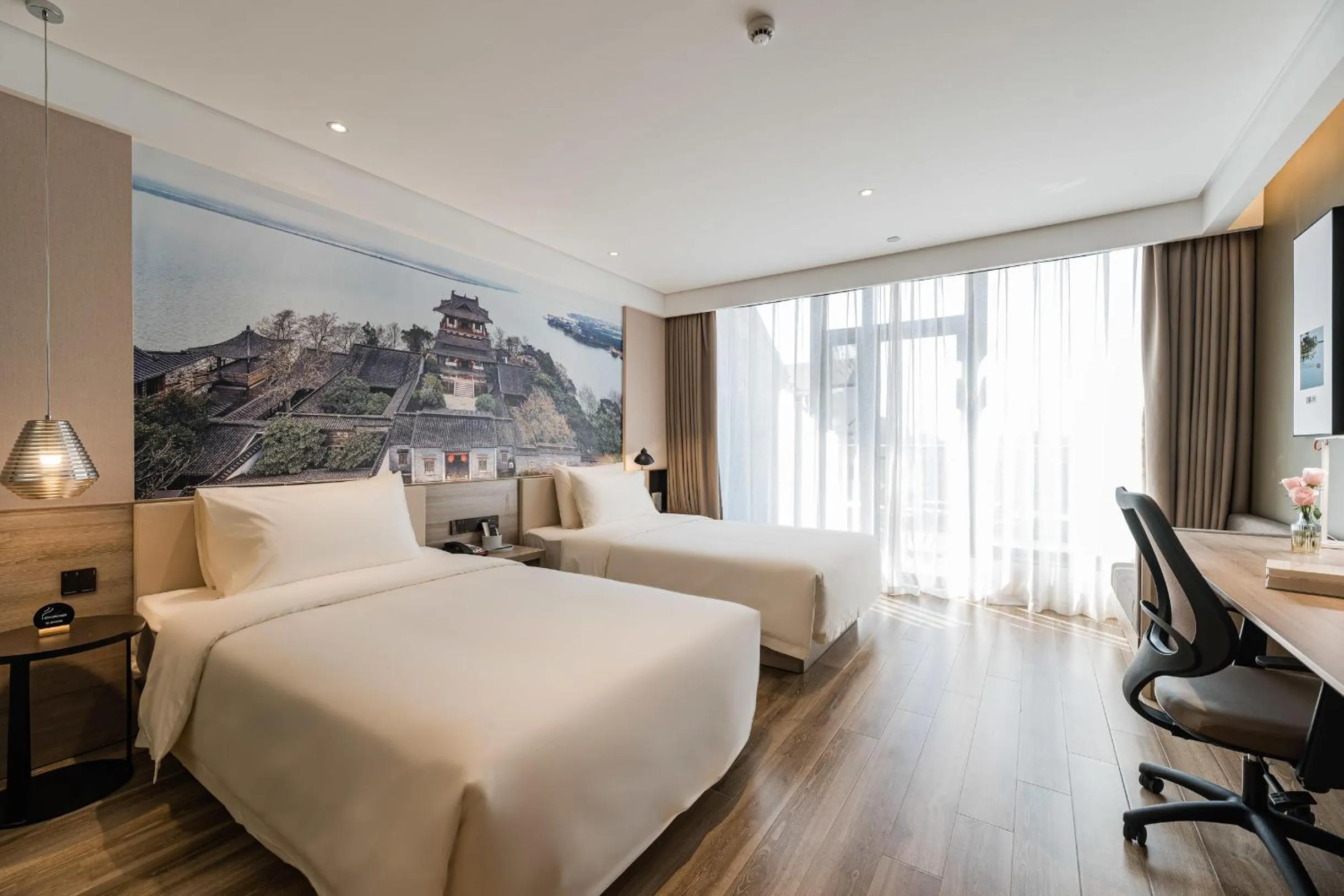 Bed in Atour Hotel Zhenjiang Xijindu Jinshan Temple