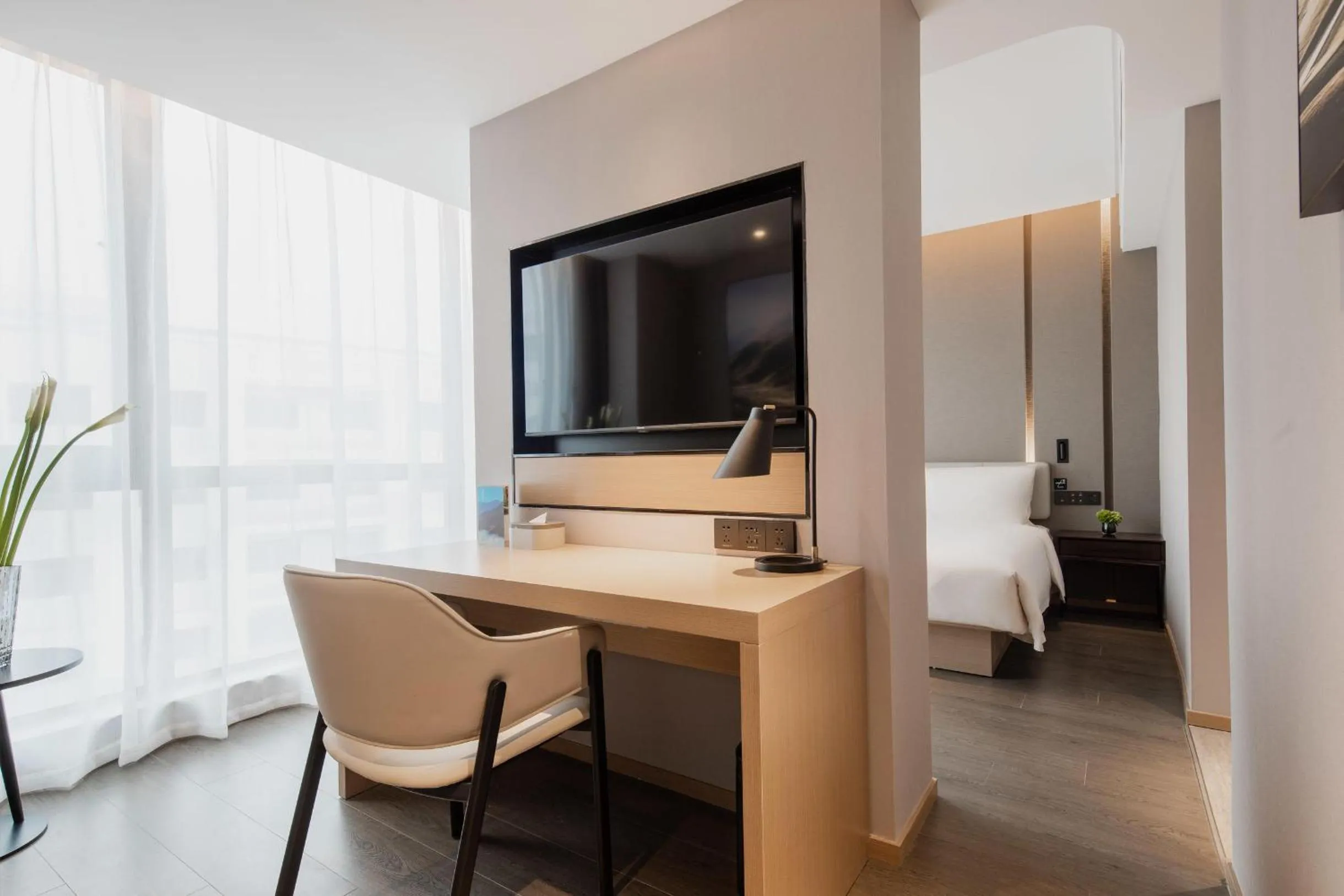 Bed in Atour Hotel Shanghai Pujiang