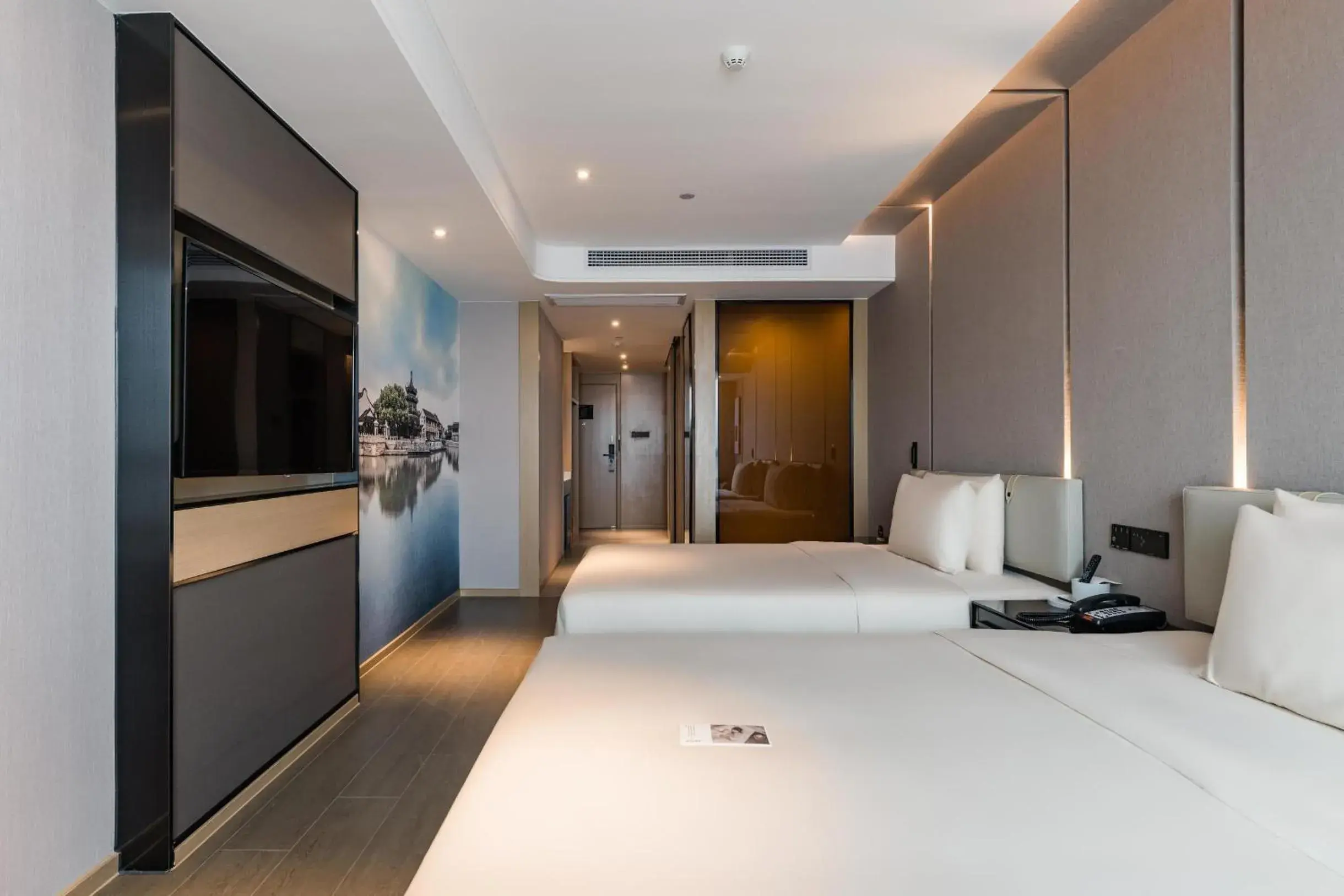 Bed in Atour Hotel Suzhou North High-Speed Railway Station Bed in Atour Hotel Suzhou North High-Speed Railway Station