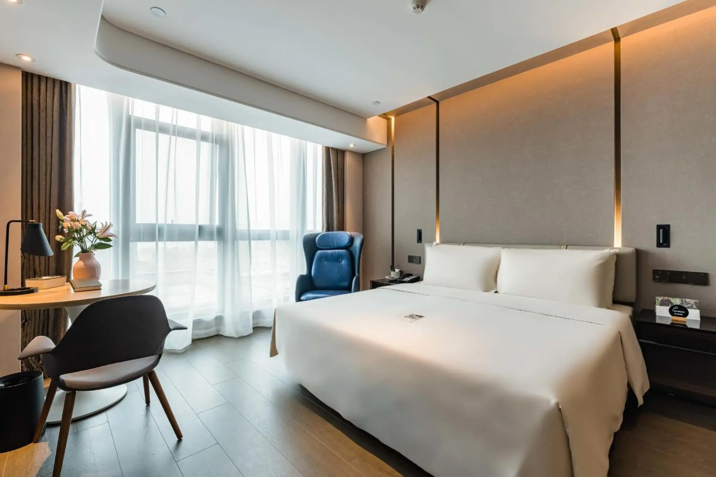 Bed in Atour Hotel Suzhou North High-Speed Railway Station Bed in Atour Hotel Suzhou North High-Speed Railway Station