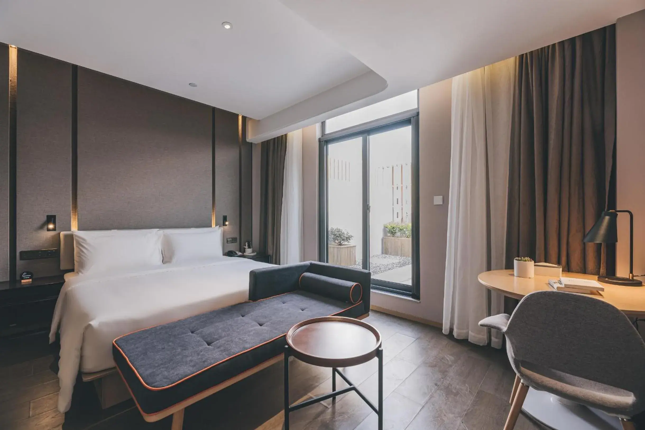 Bed in Atour Hotel Ningbo Jishi Harbor Outlets Bed in Atour Hotel Ningbo Jishi Harbor Outlets