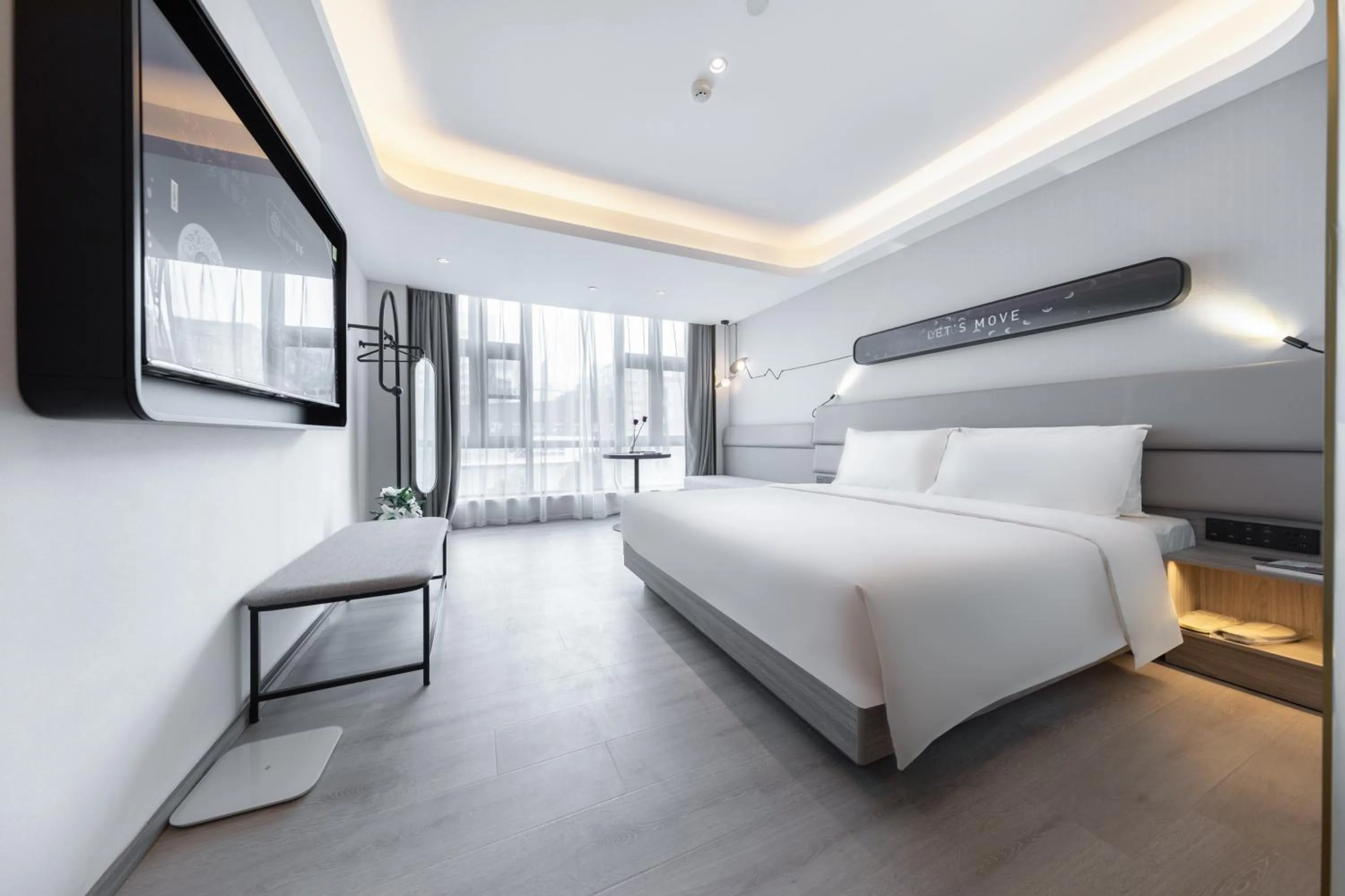 Communal lounge/ TV room, Bed in Atour Light Hotel Hefei Government Affairs Swan Lake