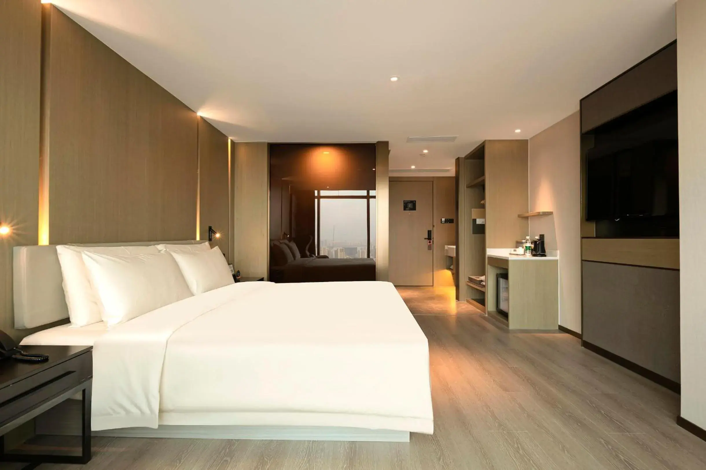 Photo of the whole room, Bed in Atour Hotel Wuhan Hankou Financial Center Photo of the whole room, Bed in Atour Hotel Wuhan Hankou Financial Center