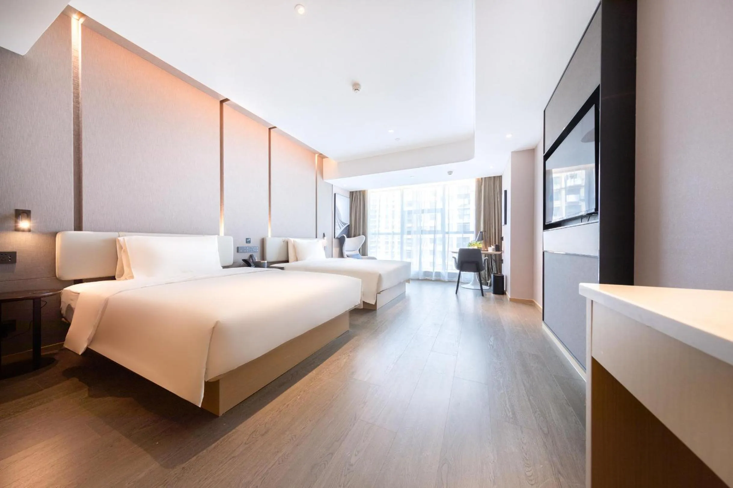 Bed in Atour Hotel Wuhan International Expo Center