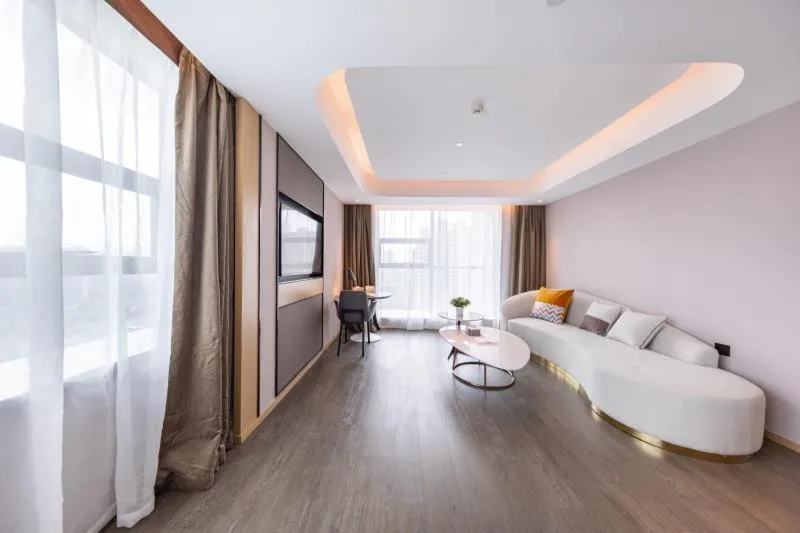 Living room, Bed in Atour Hotel Wuhan International Expo Center