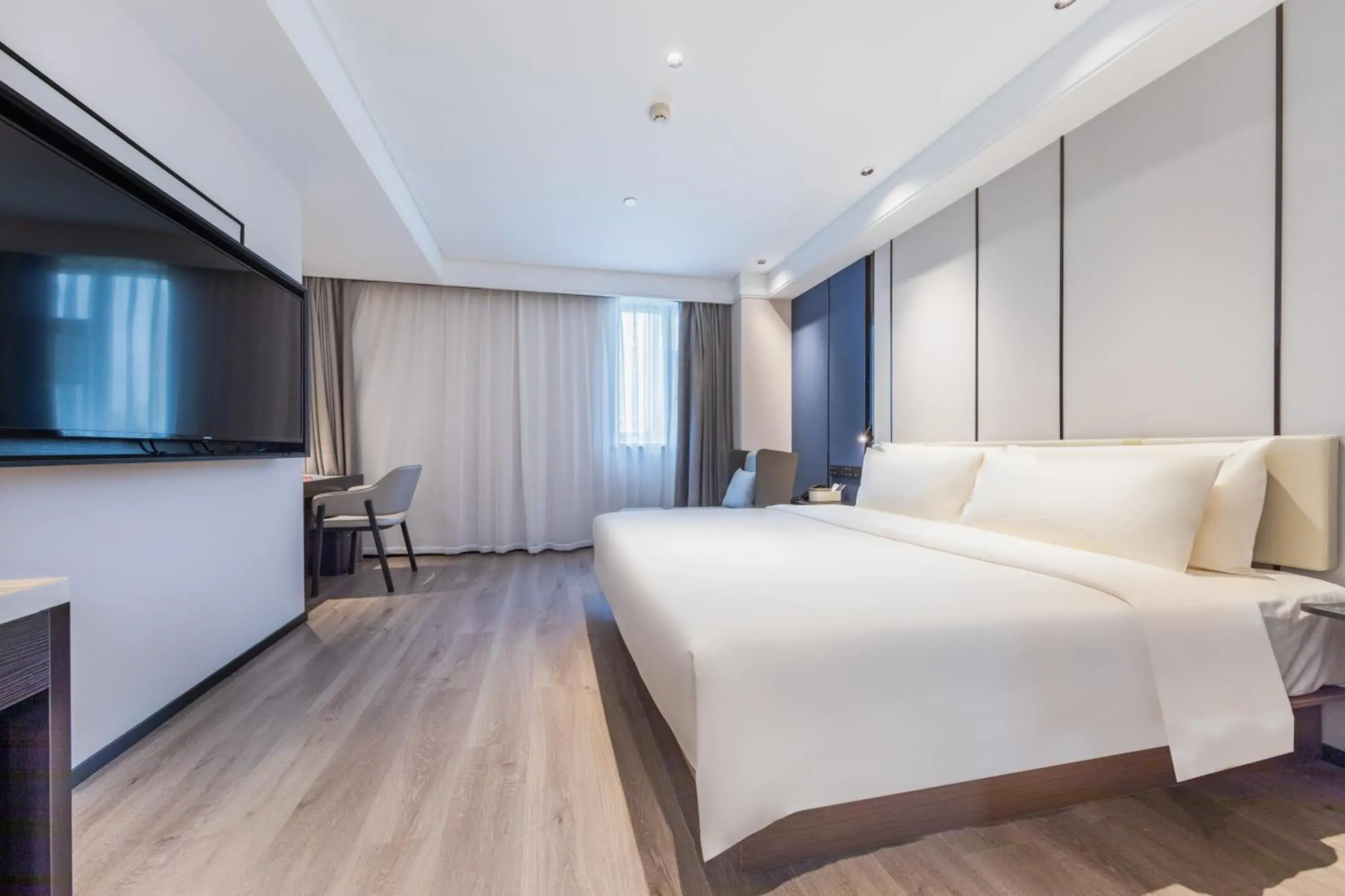 Bed in Atour Hotel Wuhan Optics Valley Square Yangjia Bay Bed in Atour Hotel Wuhan Optics Valley Square Yangjia Bay