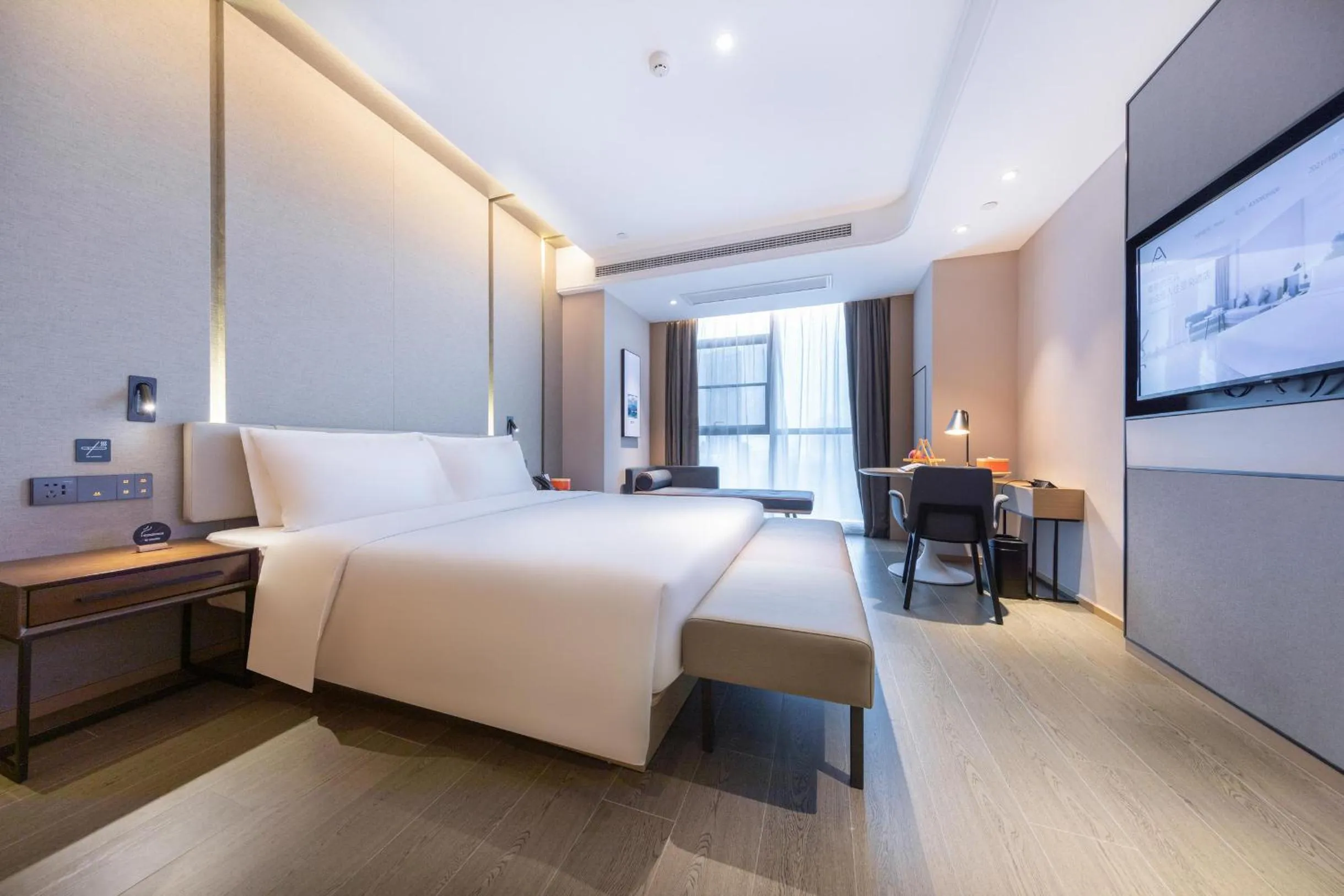 Photo of the whole room, Bed in Atour Hotel Meishan Government Affairs Center