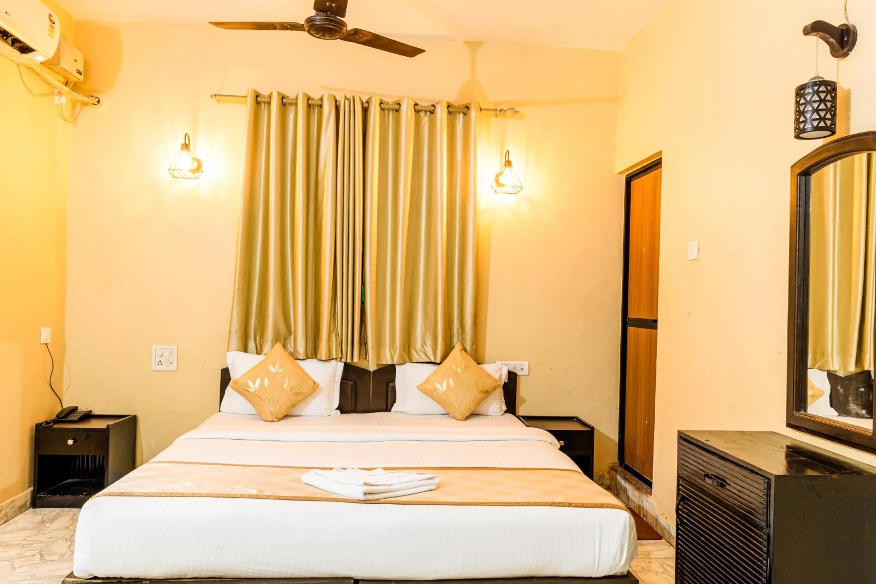 Bedroom in Baga Fantacia Beach Inn