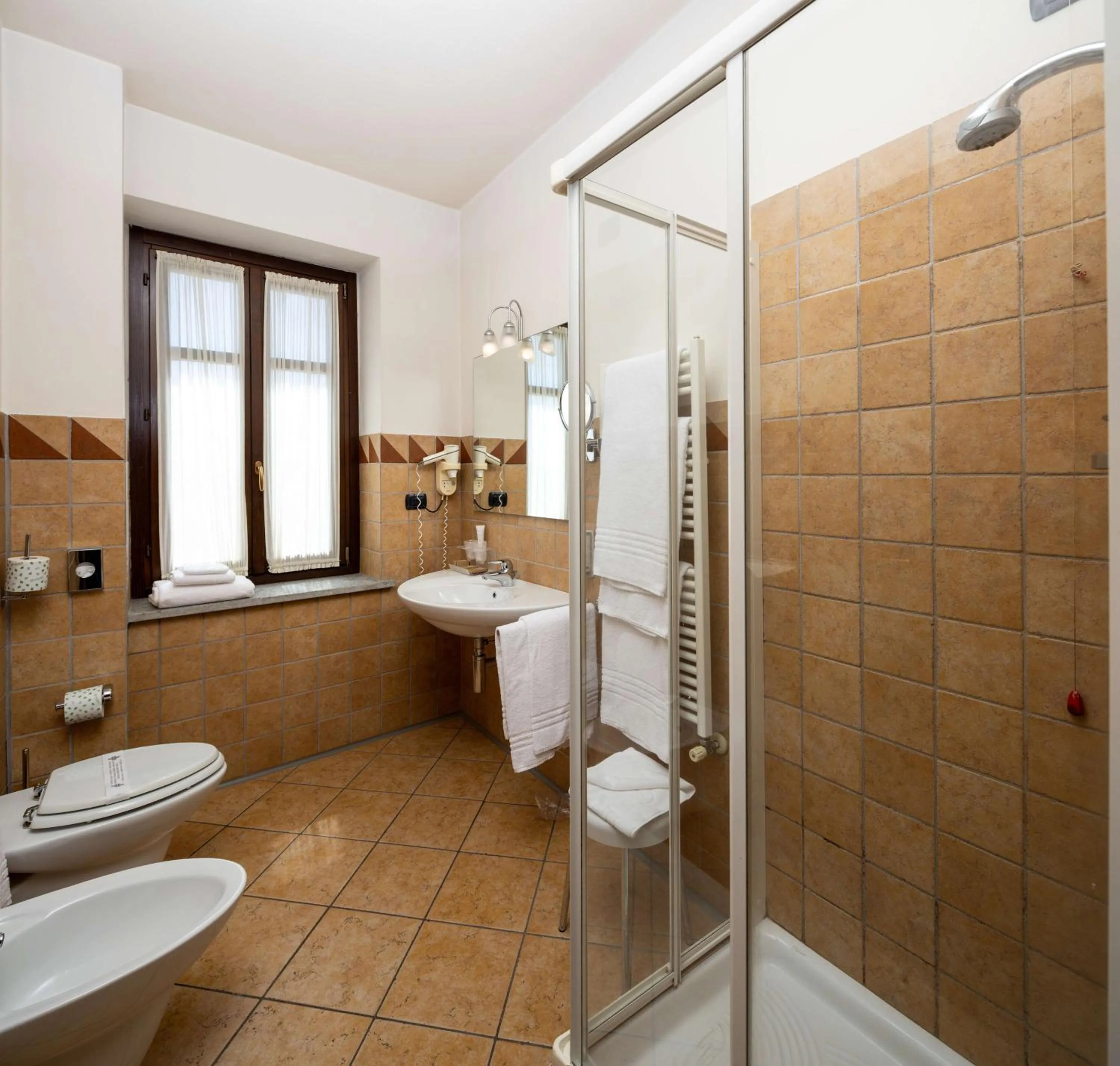 Shower in Best Western Plus Hotel Le Rondini