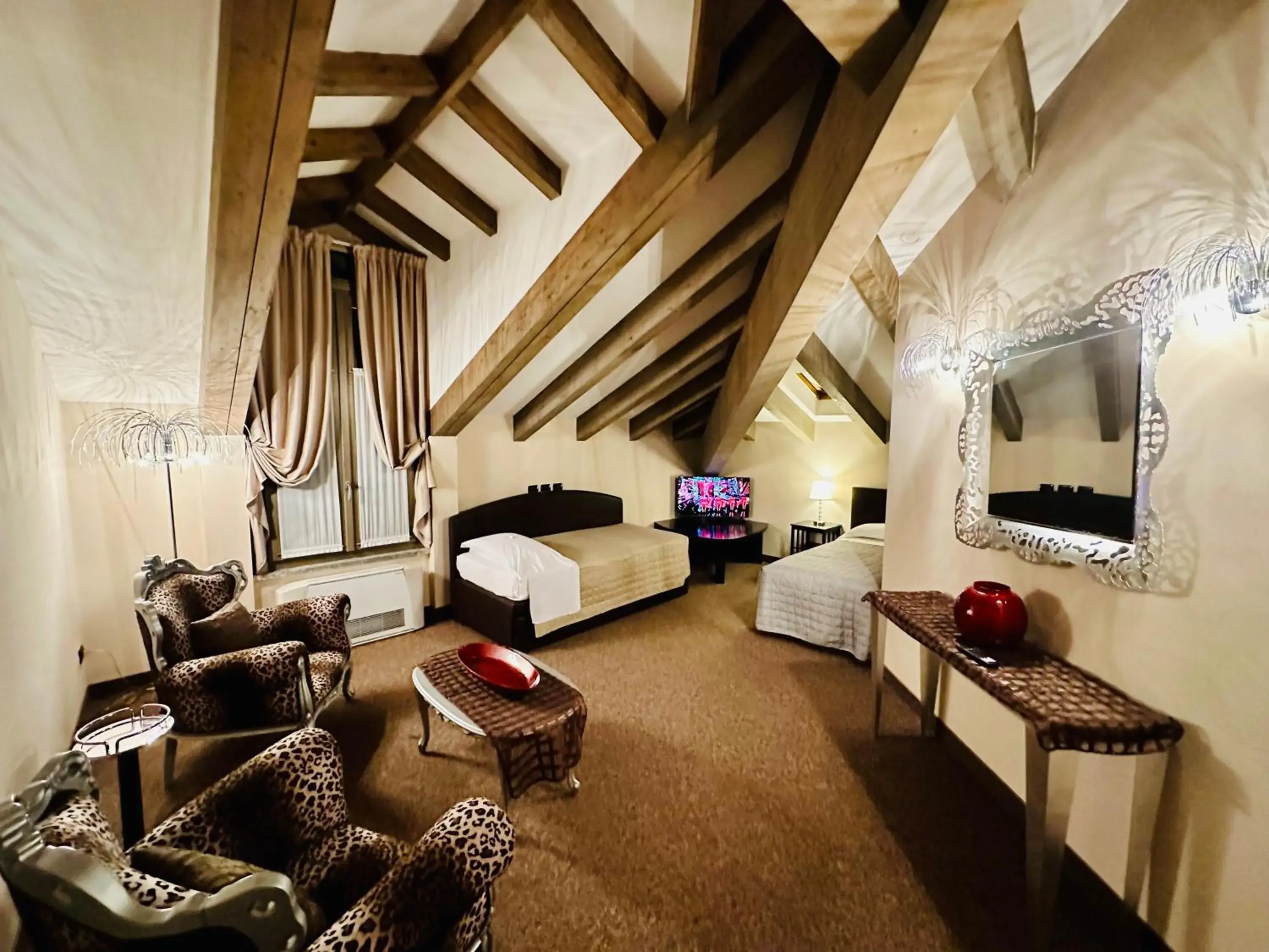 Communal lounge/ TV room, Bed in Hotel Malpensa INN Aereoporto Communal lounge/ TV room, Bed in Hotel Malpensa INN Aereoporto