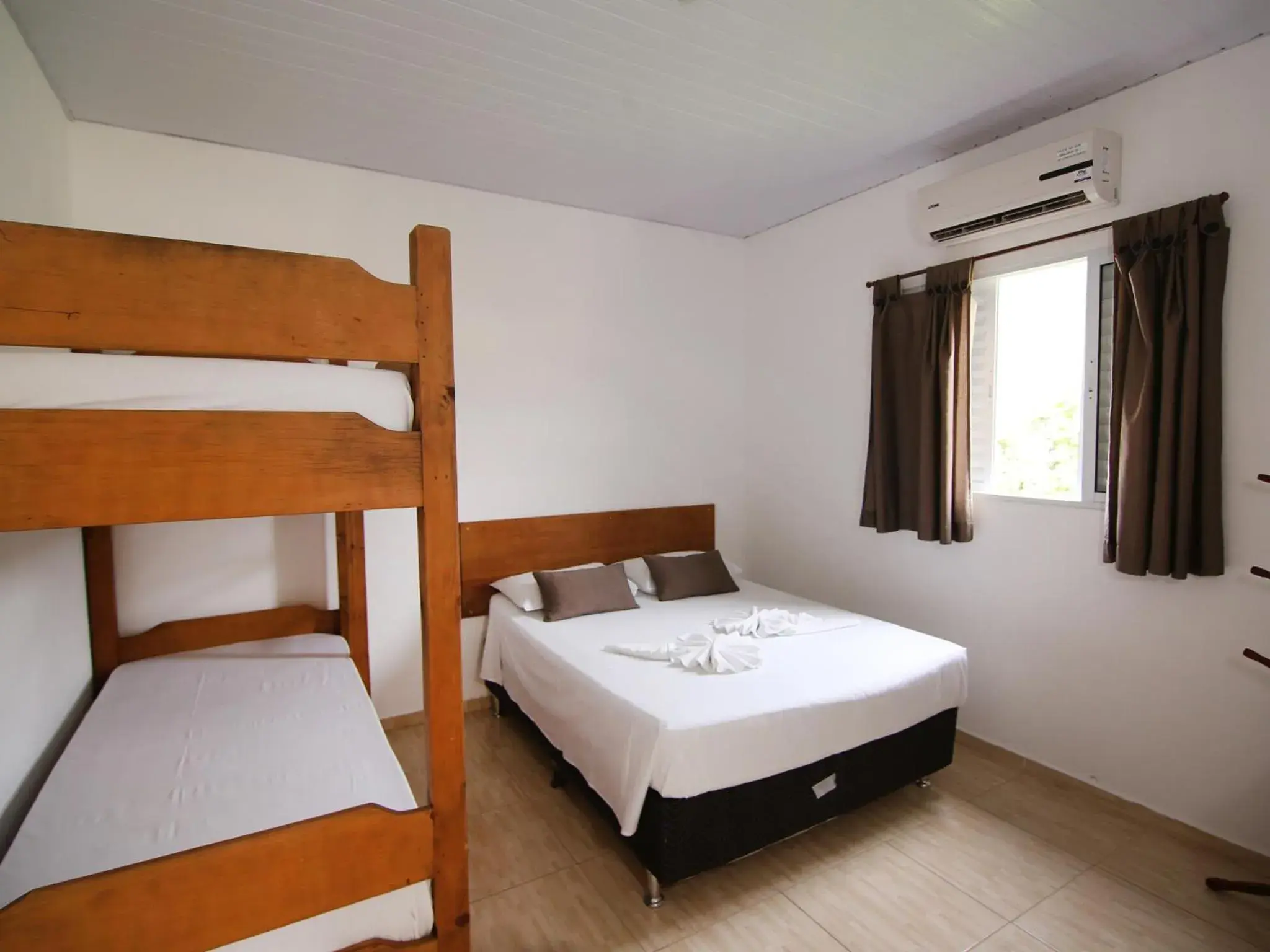 Deluxe Quadruple Room in Pousada Vale da Montanha Deluxe Quadruple Room in Pousada Vale da Montanha