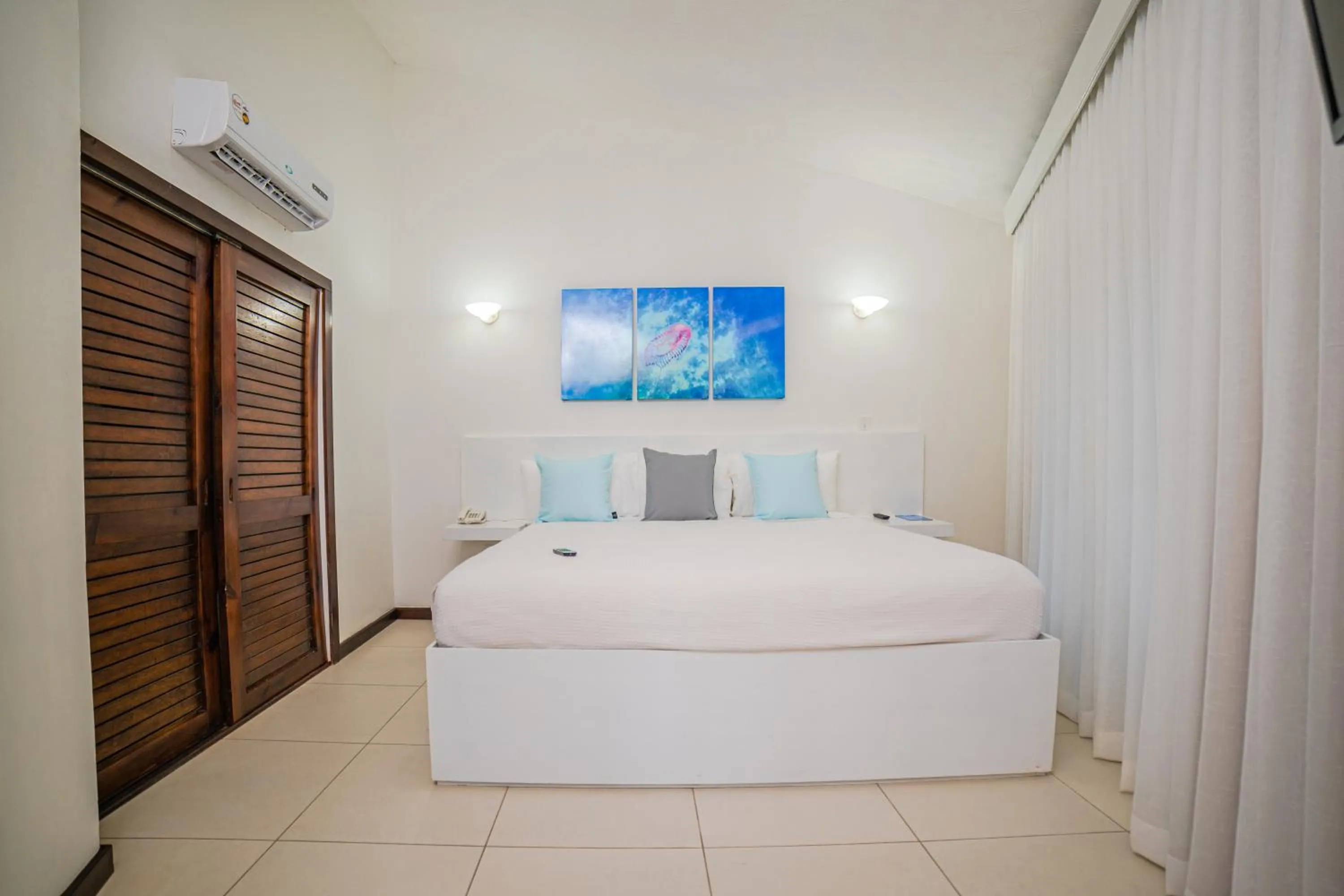 Bedroom, Bed in Paradise Beach Resort & Dive Center