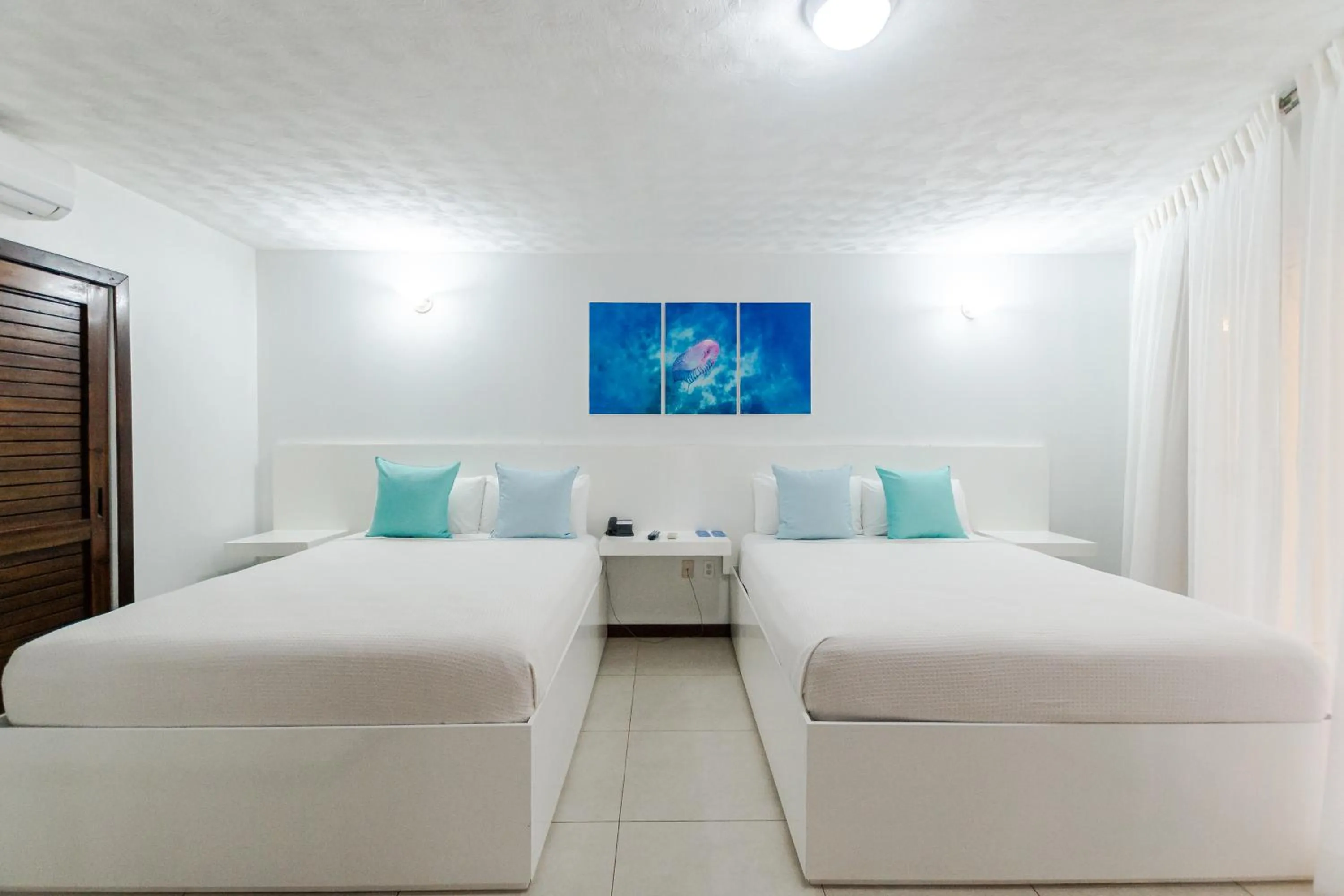 Photo of the whole room, Bed in Paradise Beach Resort & Dive Center