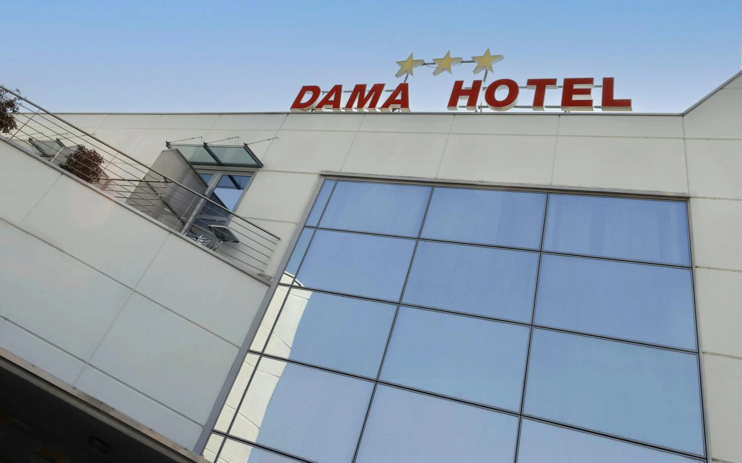Property logo or sign in Dama Hotel