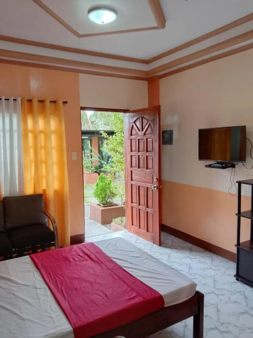 Photo of the whole room, Bed in RedDoorz @ Solid Rock Guest House Baler