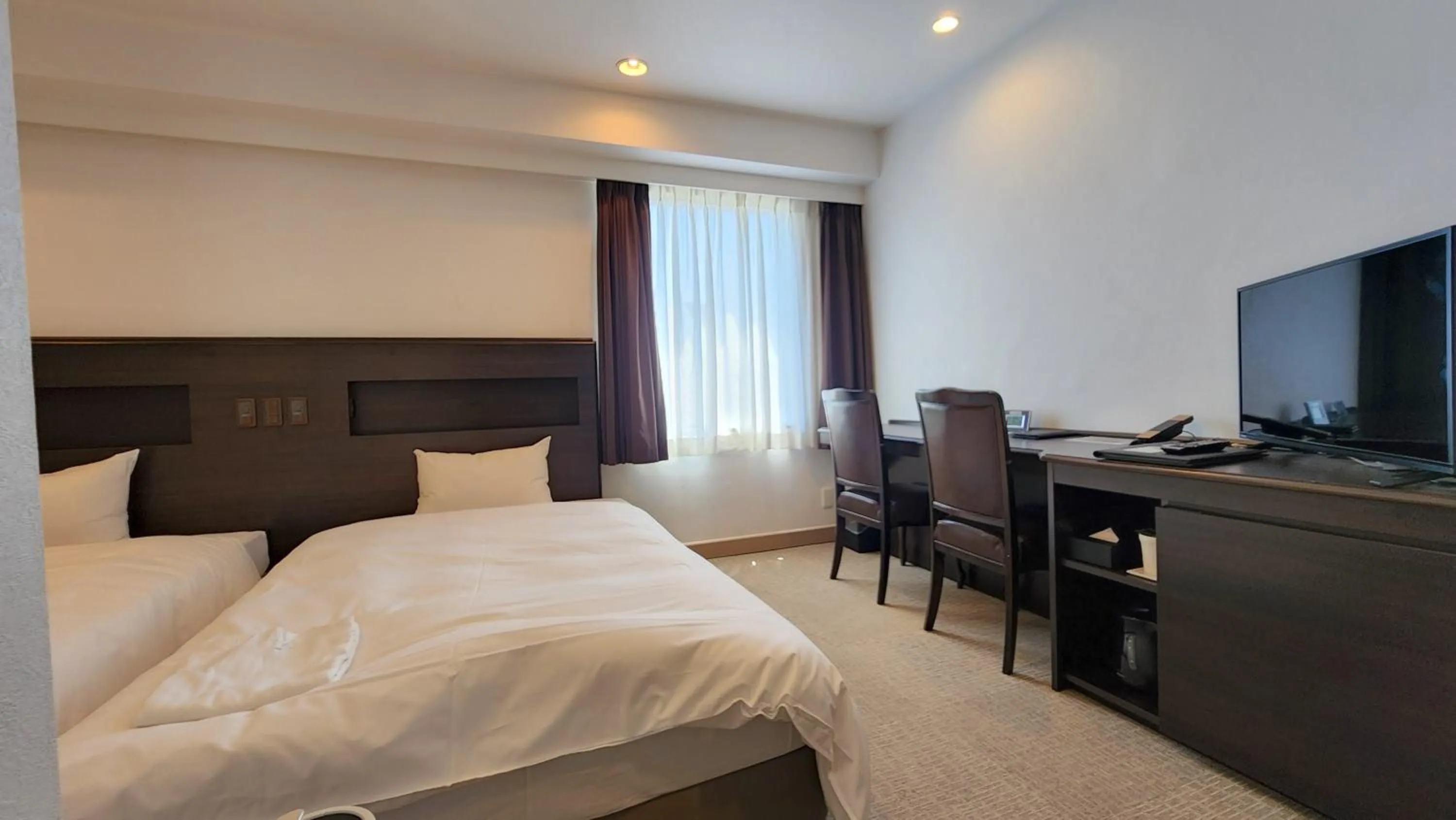 Bed in Platon Hotel Yokkaichi