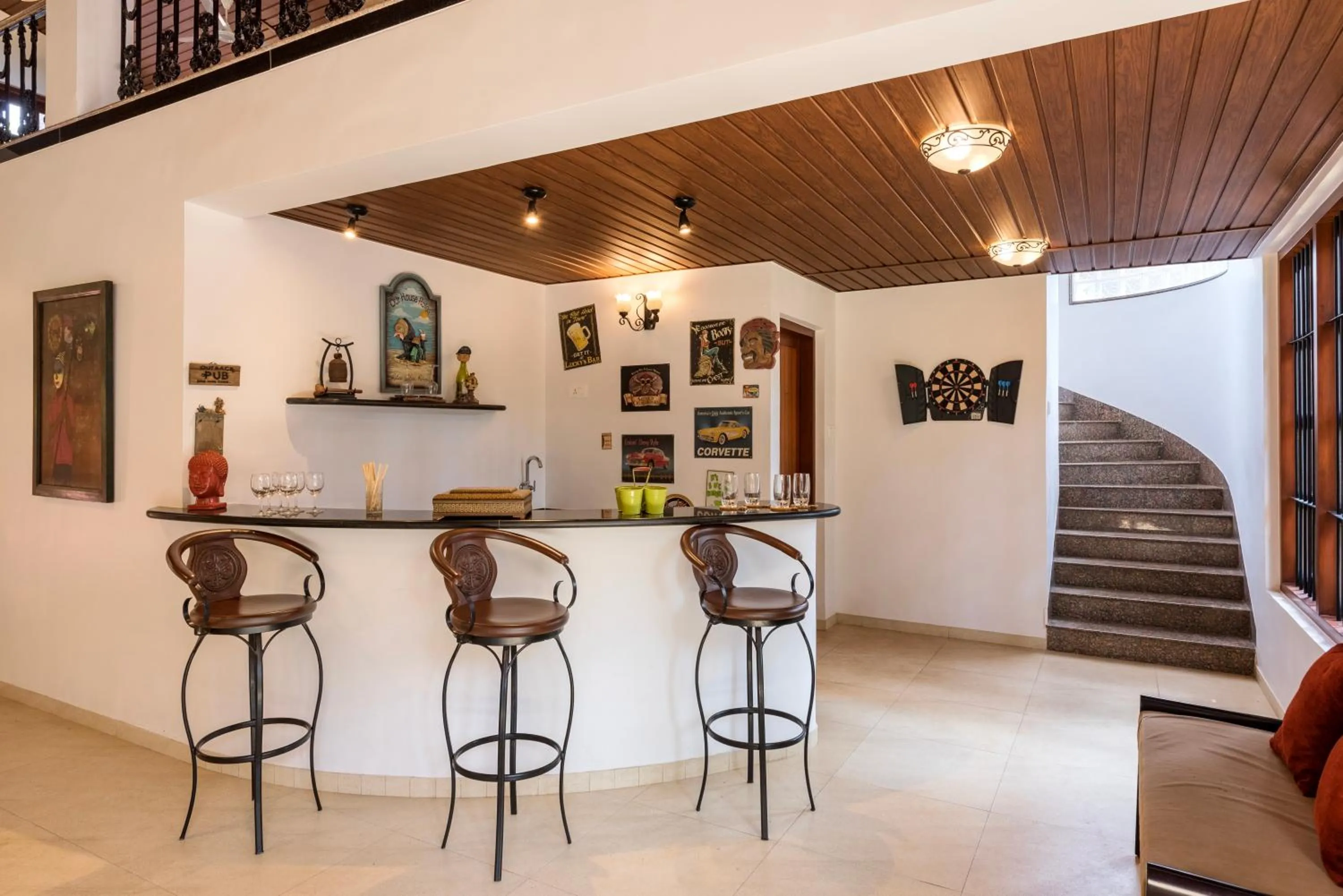 Living room in SaffronStays Casa Del Palms - 8BR luxury pool villa with gazebo, pickleball, bar & lawns near Nagaon Beach