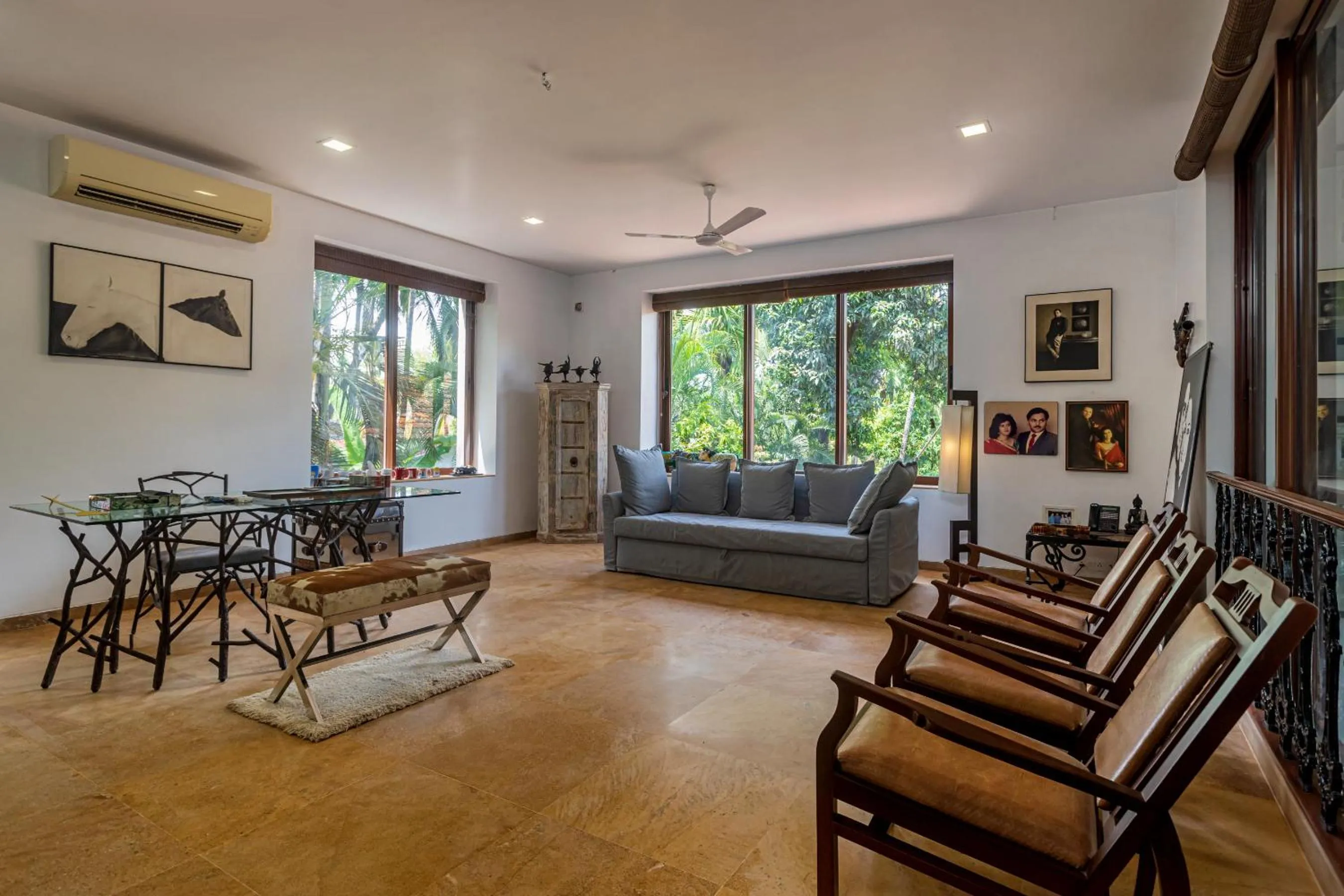 Seating area in SaffronStays Casa Del Palms - 8BR luxury pool villa with gazebo, pickleball, bar & lawns near Nagaon Beach