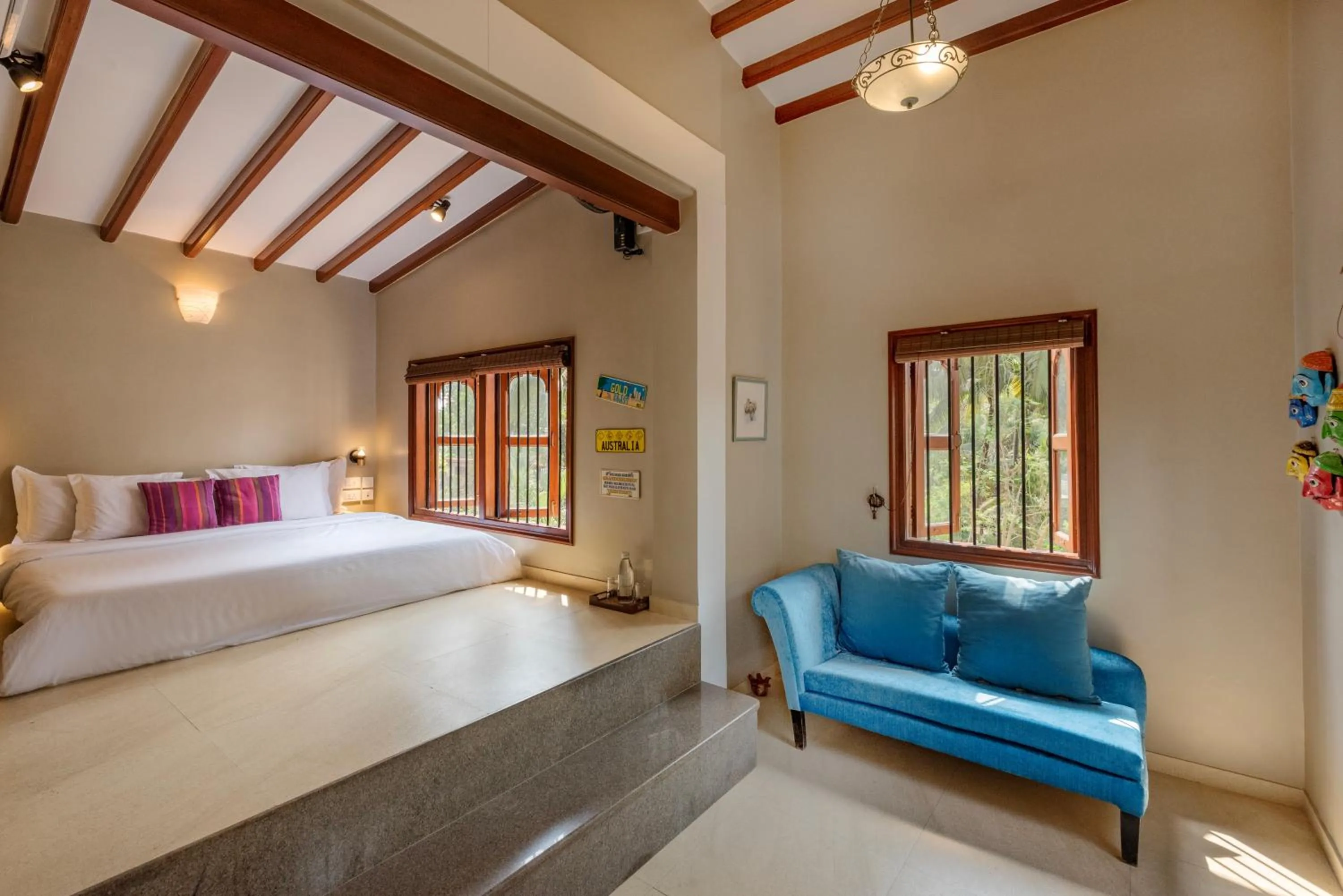Bed in SaffronStays Casa Del Palms - 8BR luxury pool villa with gazebo, pickleball, bar & lawns near Nagaon Beach
