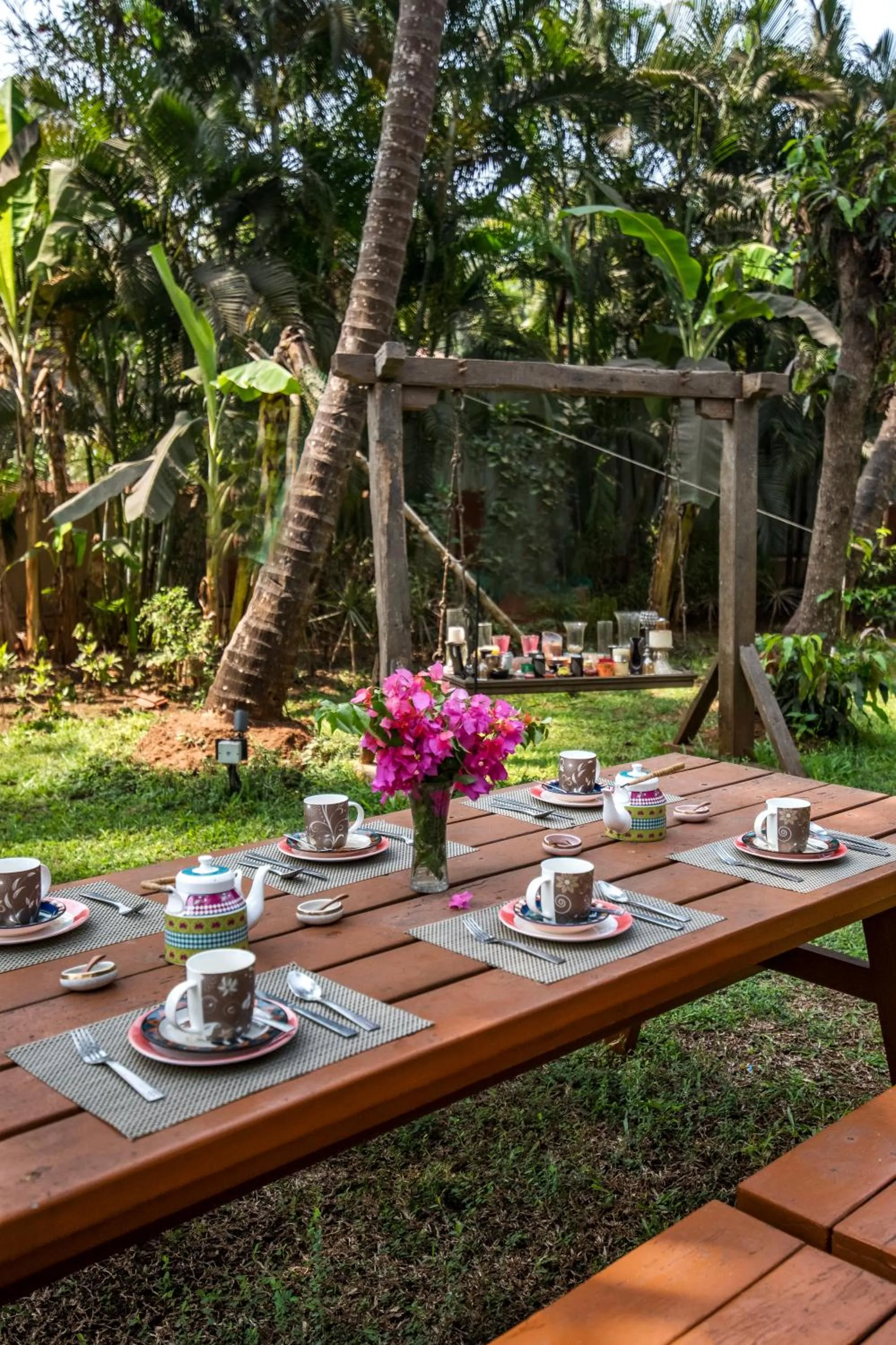 Garden in SaffronStays Casa Del Palms - 8BR luxury pool villa with gazebo, pickleball, bar & lawns near Nagaon Beach