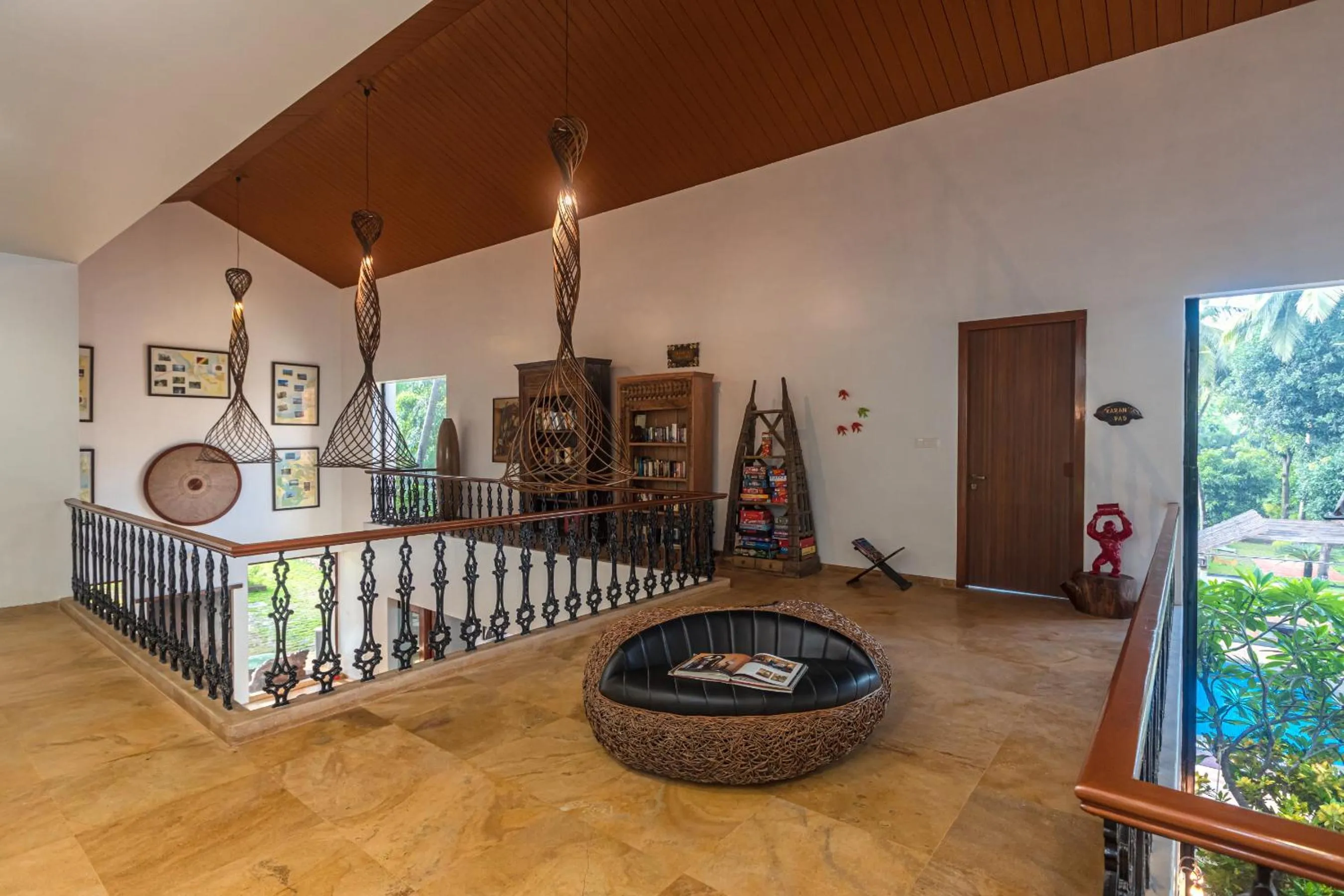 Library in SaffronStays Casa Del Palms - 8BR luxury pool villa with gazebo, pickleball, bar & lawns near Nagaon Beach