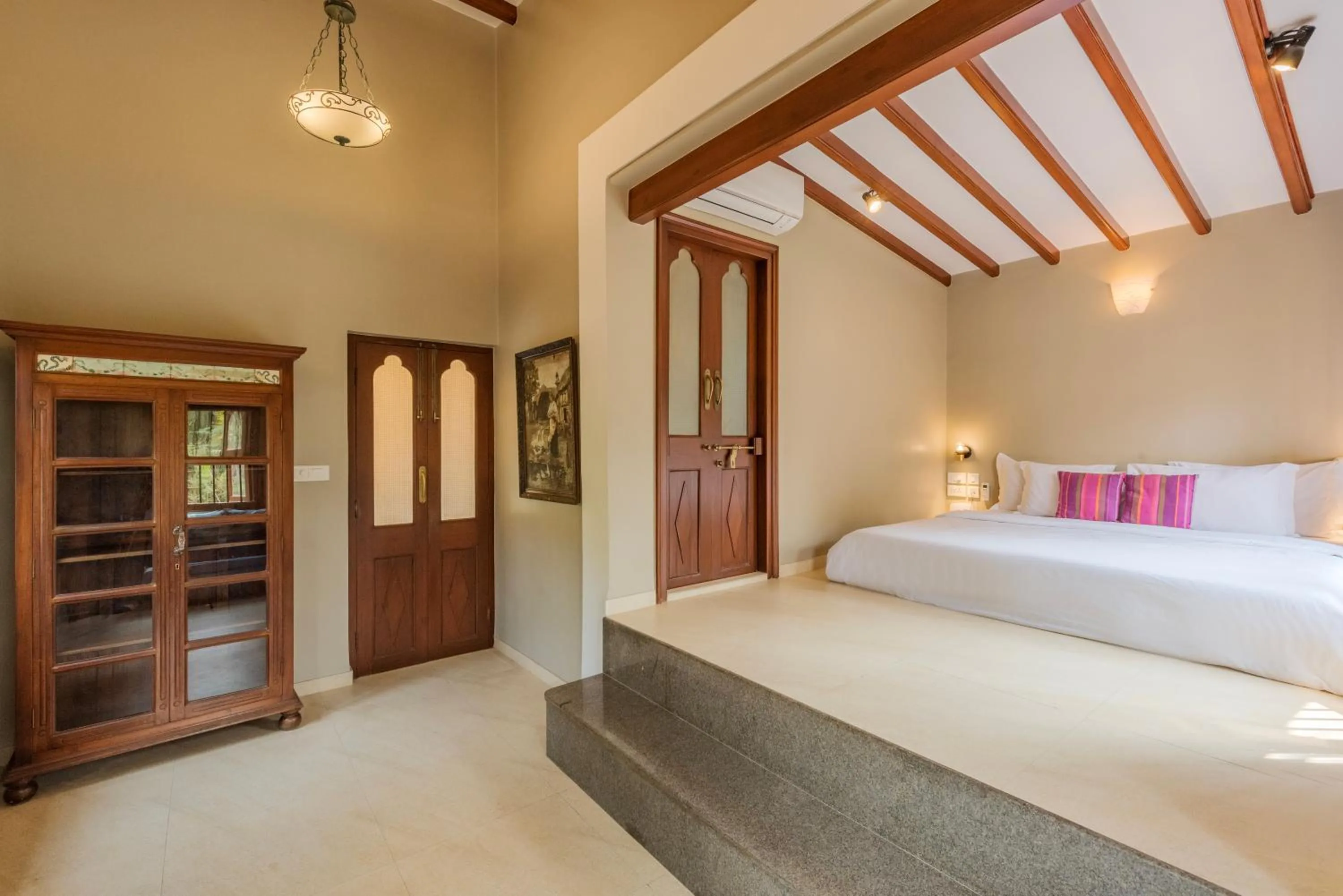 Bed in SaffronStays Casa Del Palms - 8BR luxury pool villa with gazebo, pickleball, bar & lawns near Nagaon Beach