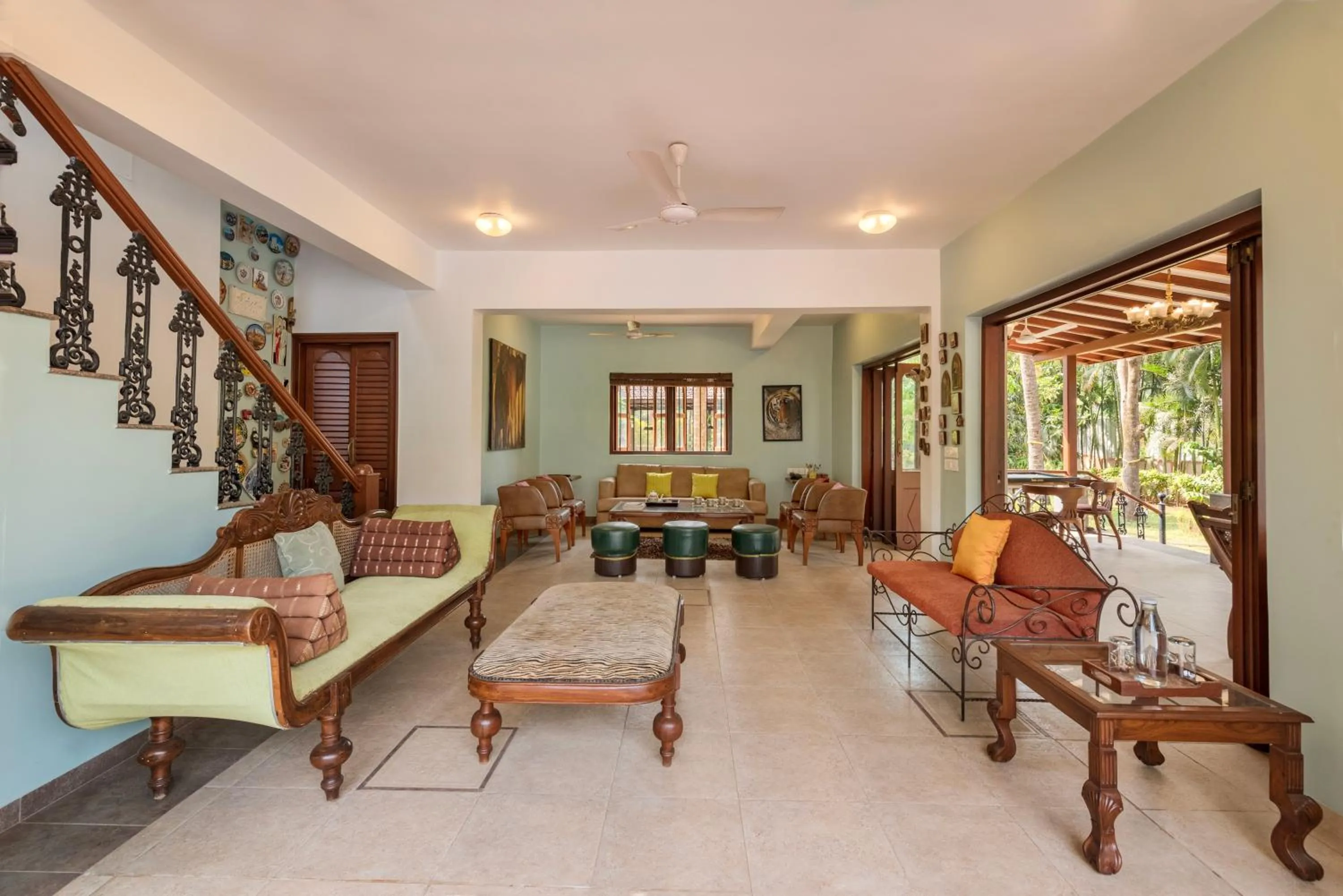 Patio in SaffronStays Casa Del Palms - 8BR luxury pool villa with gazebo, pickleball, bar & lawns near Nagaon Beach