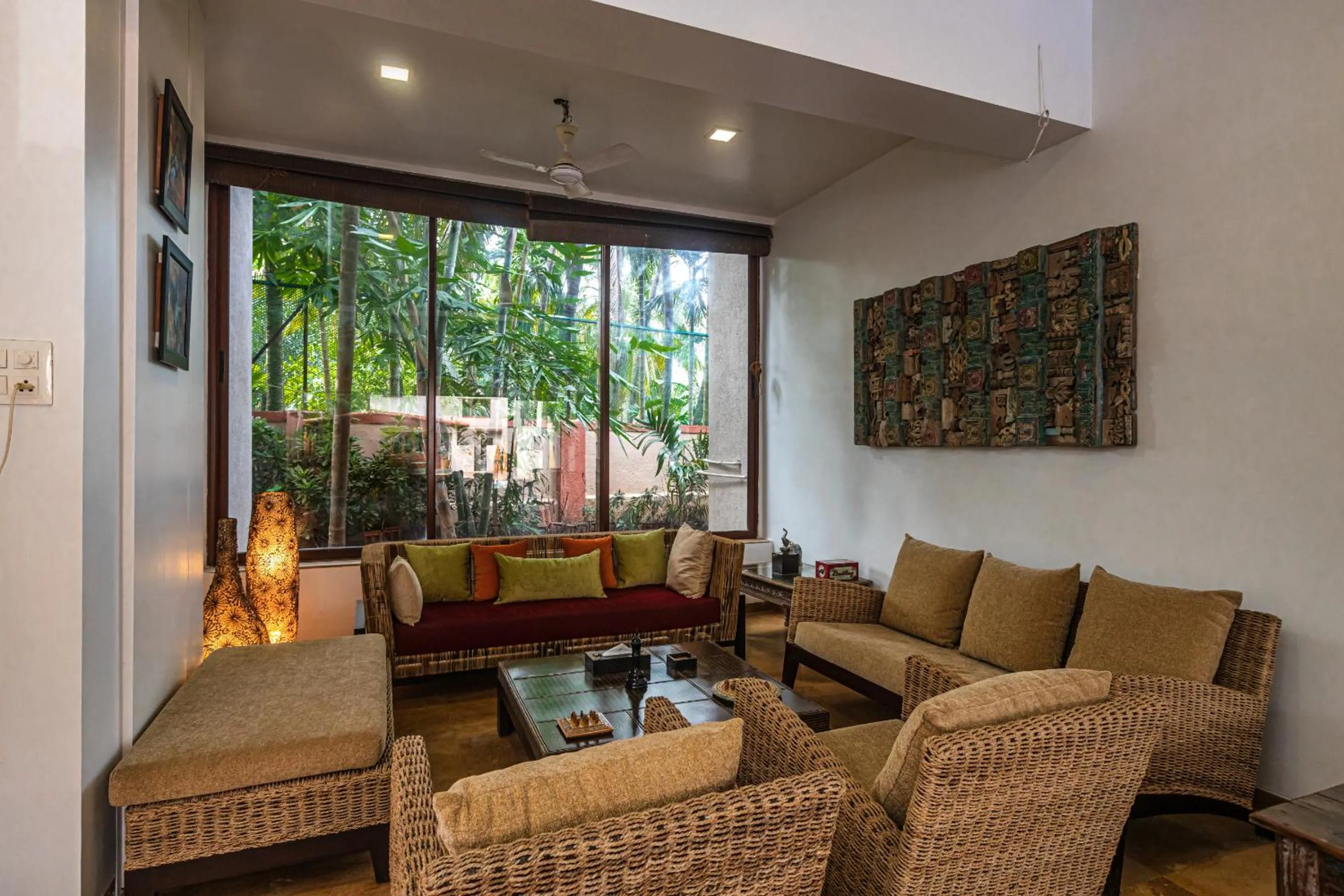 Living room in SaffronStays Casa Del Palms - 8BR luxury pool villa with gazebo, pickleball, bar & lawns near Nagaon Beach