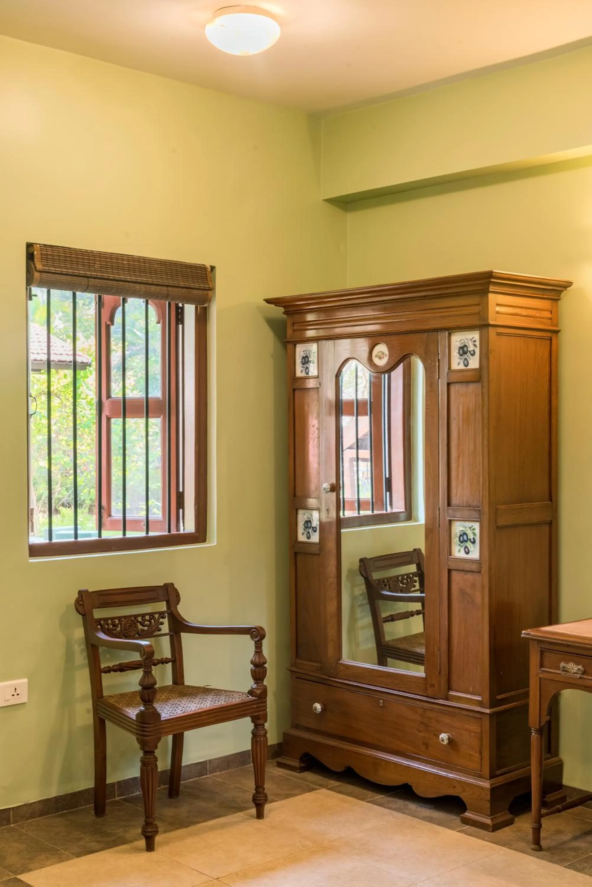 Seating area in SaffronStays Casa Del Palms - 8BR luxury pool villa with gazebo, pickleball, bar & lawns near Nagaon Beach