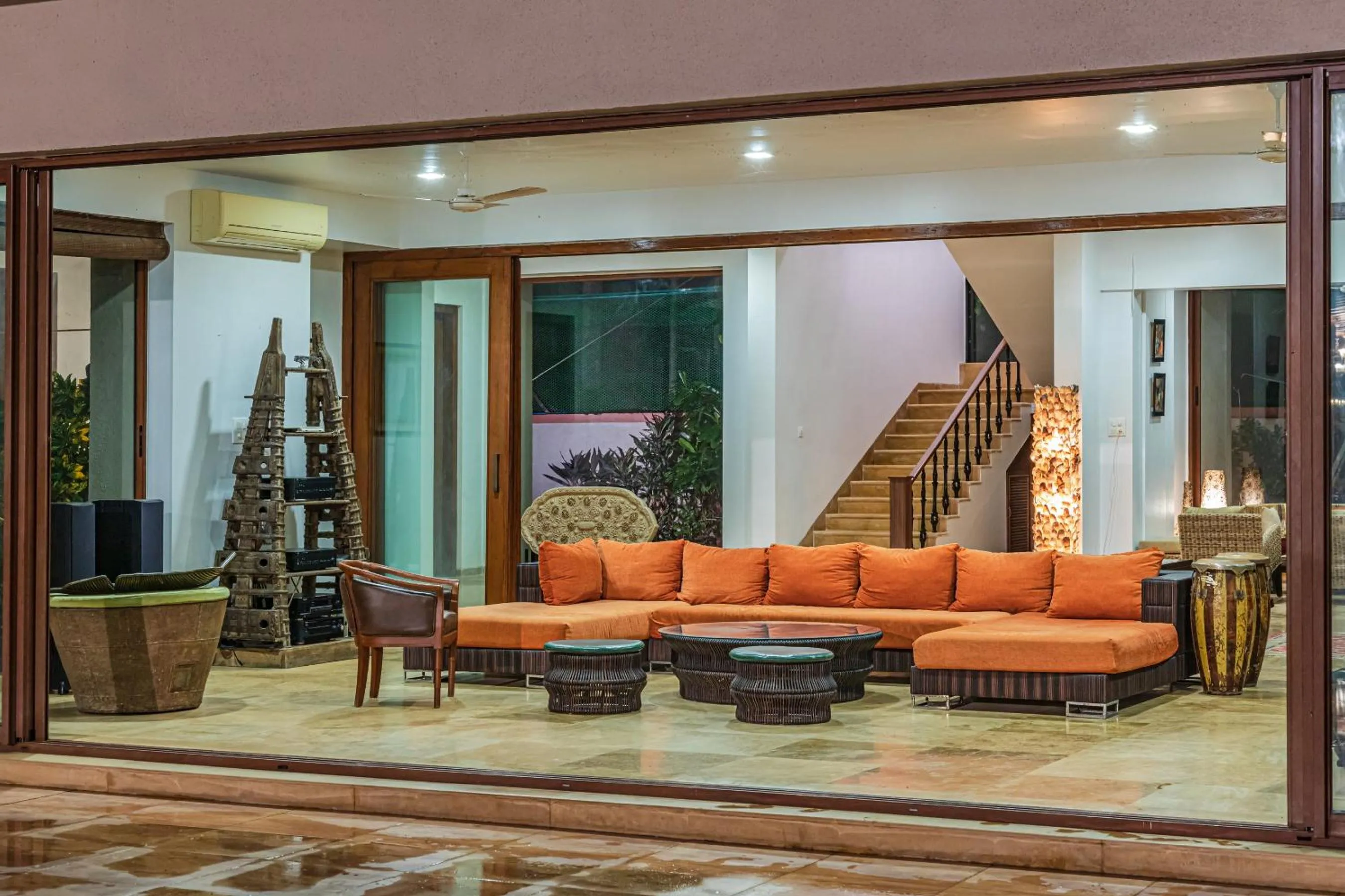 Facade/entrance in SaffronStays Casa Del Palms - 8BR luxury pool villa with gazebo, pickleball, bar & lawns near Nagaon Beach