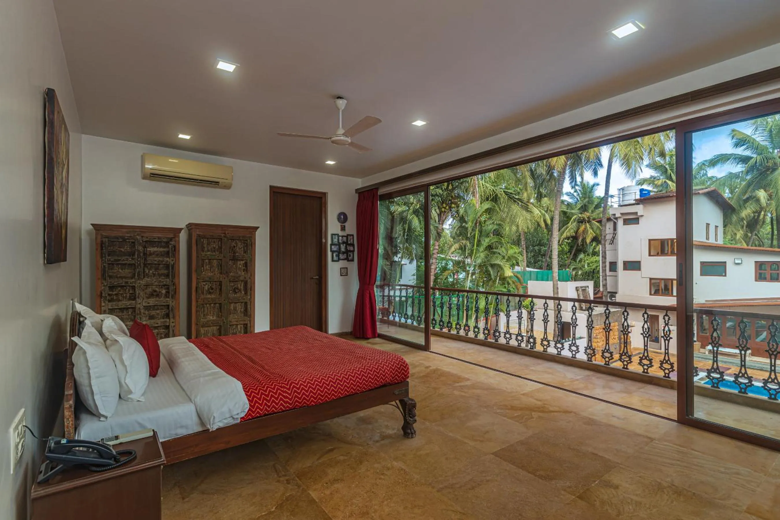Bed in SaffronStays Casa Del Palms - 8BR luxury pool villa with gazebo, pickleball, bar & lawns near Nagaon Beach