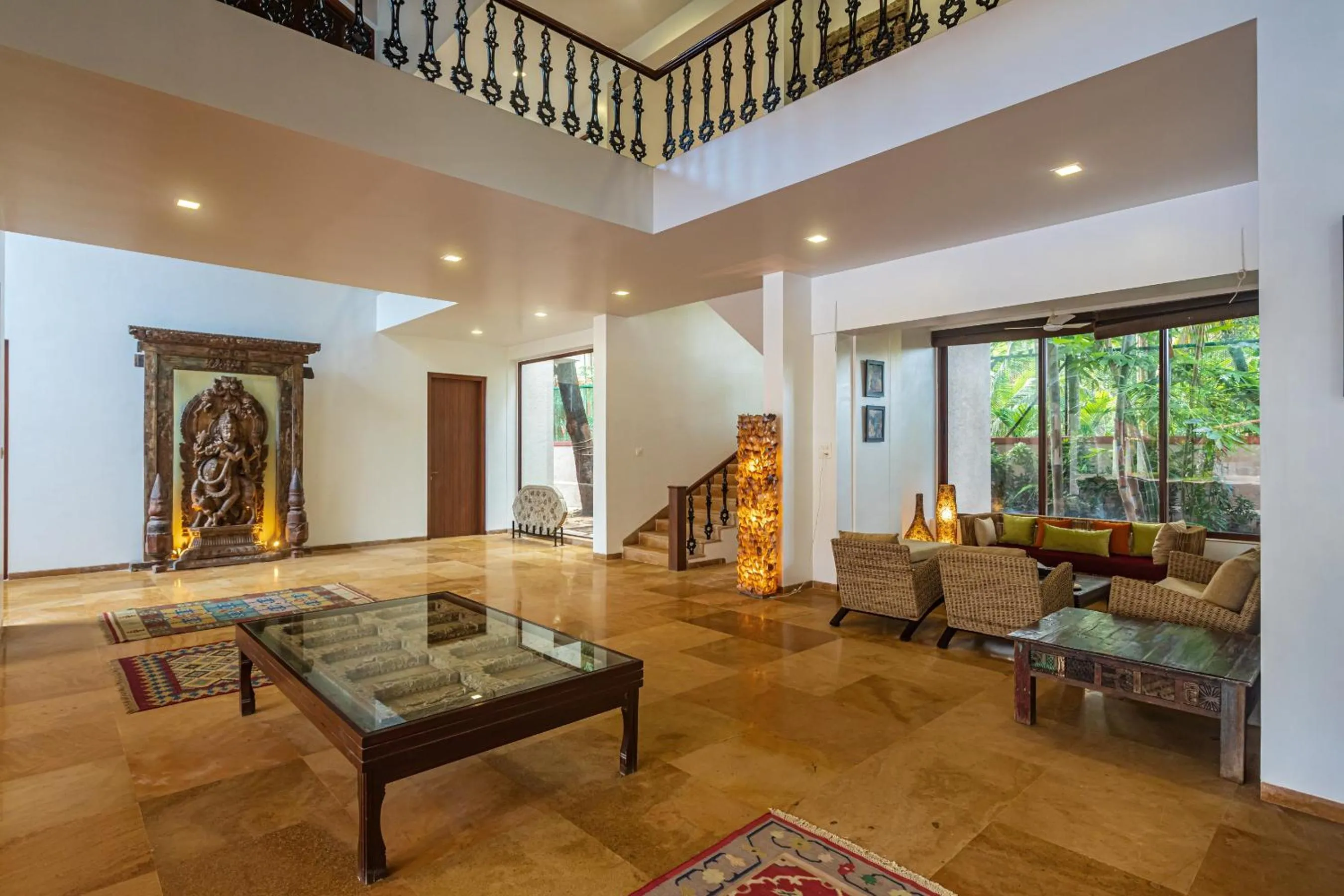 Living room in SaffronStays Casa Del Palms - 8BR luxury pool villa with gazebo, pickleball, bar & lawns near Nagaon Beach