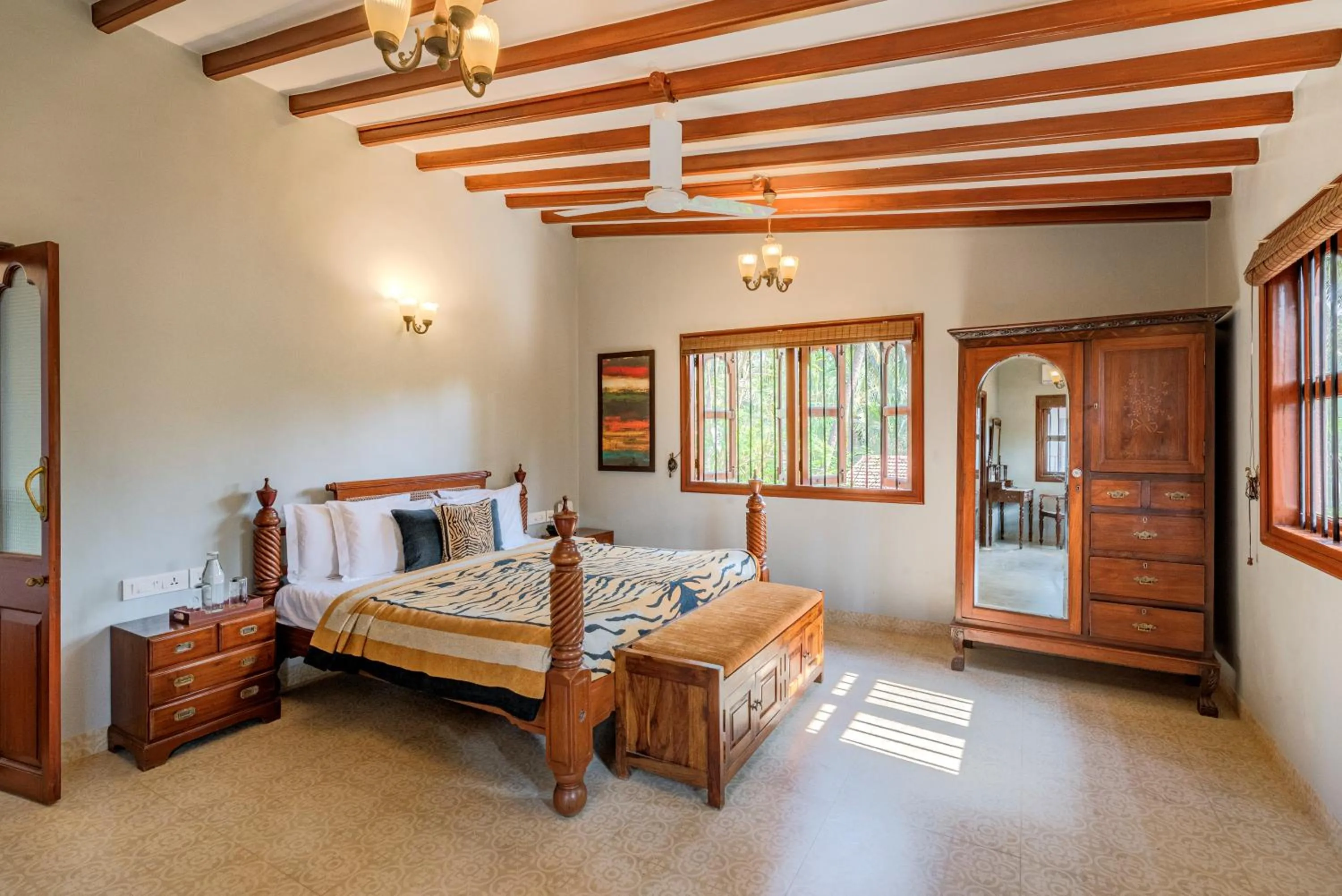 Bed in SaffronStays Casa Del Palms - 8BR luxury pool villa with gazebo, pickleball, bar & lawns near Nagaon Beach