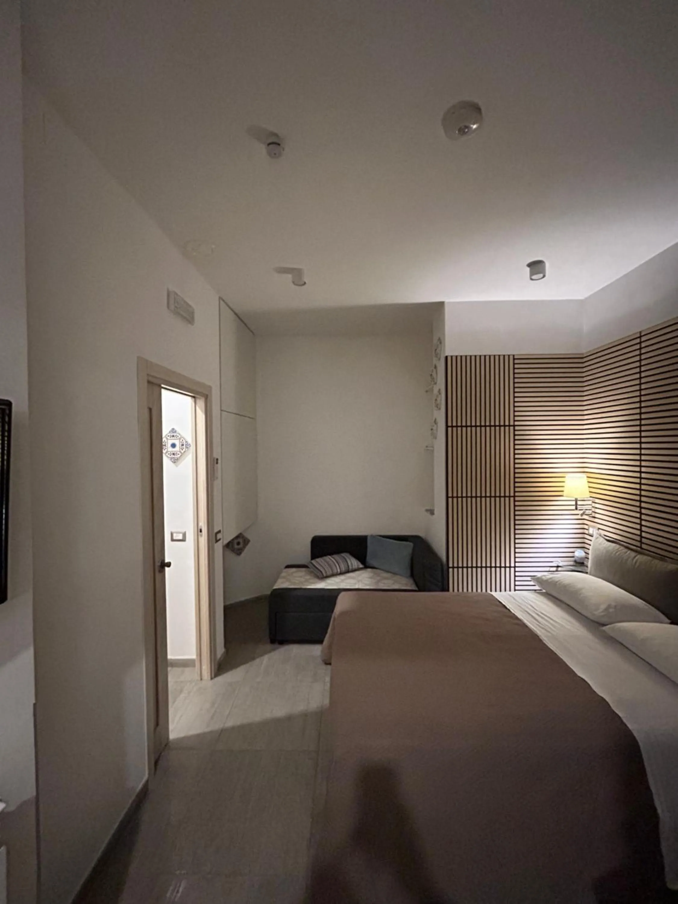 Bed in International Naples