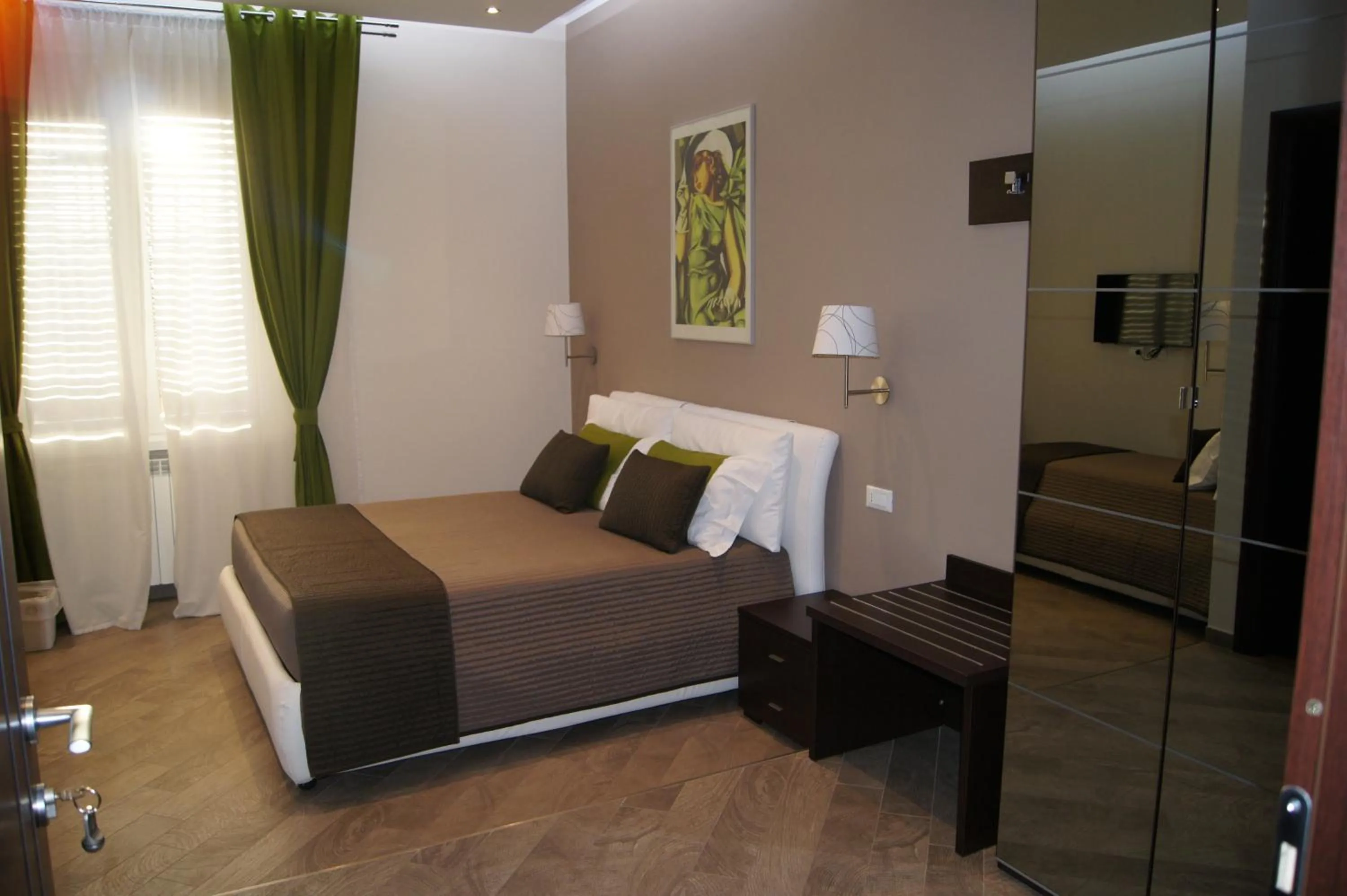 Photo of the whole room, Bed in Mia Suites