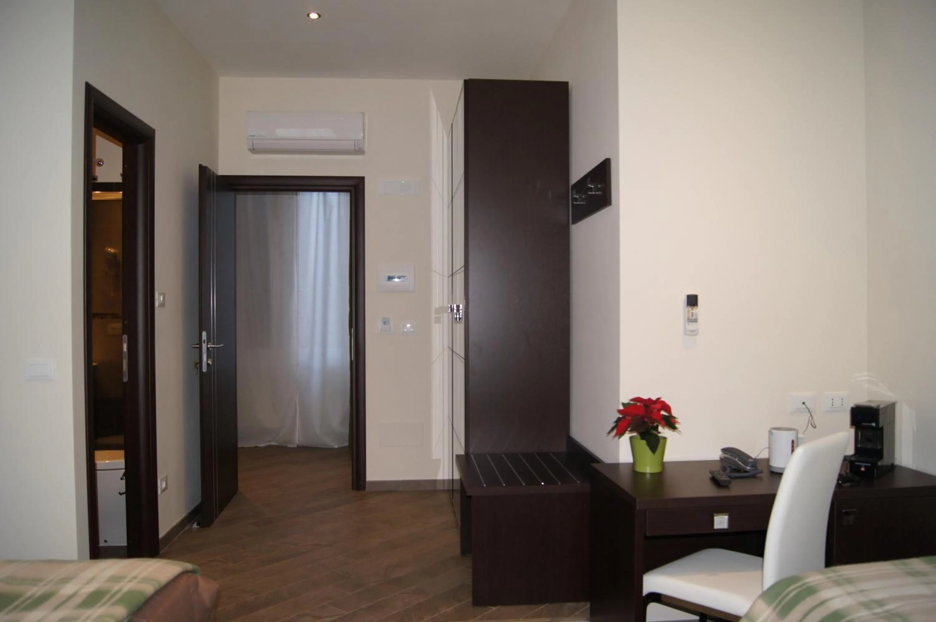 Photo of the whole room, Bed in Mia Suites