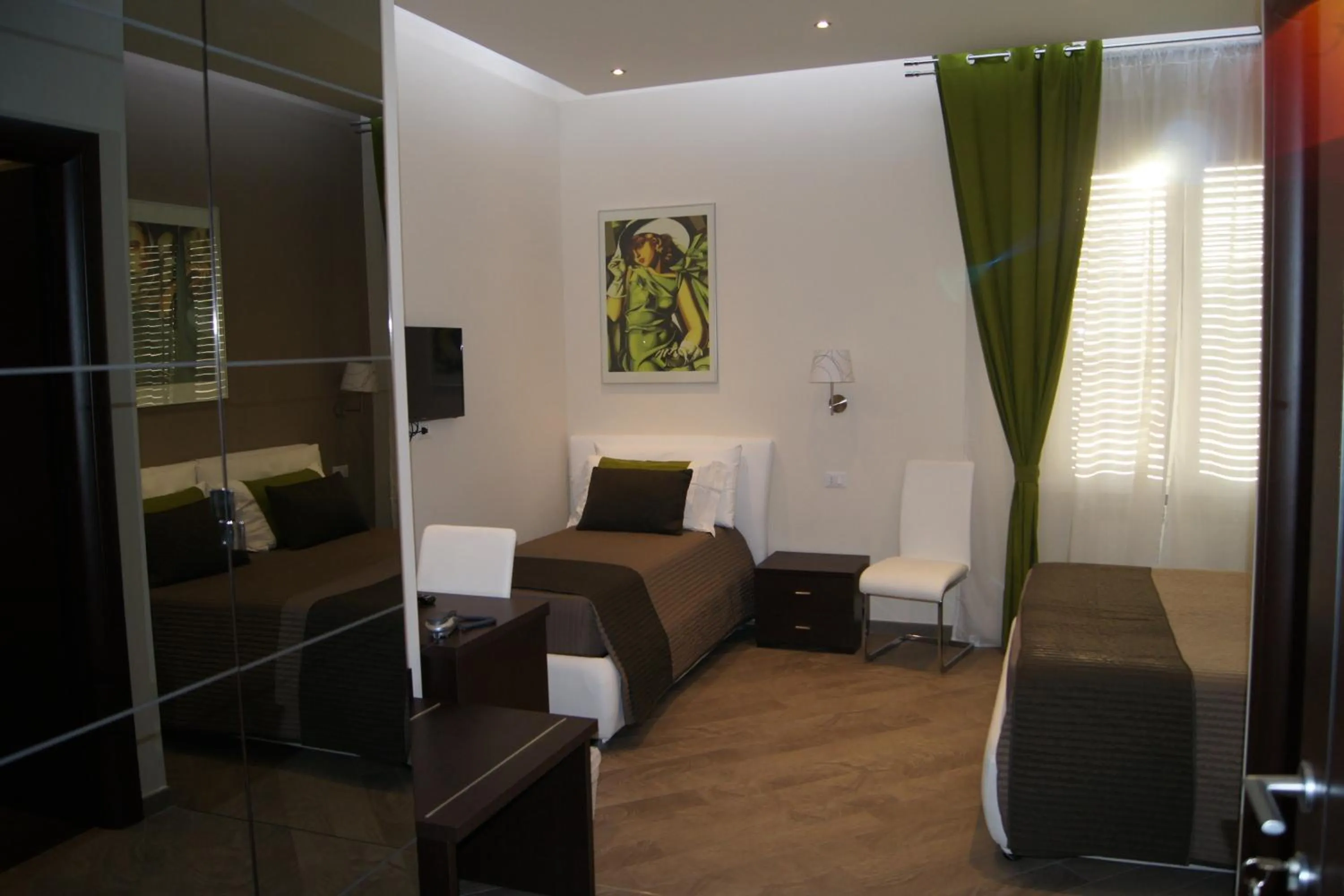 Photo of the whole room, Bed in Mia Suites