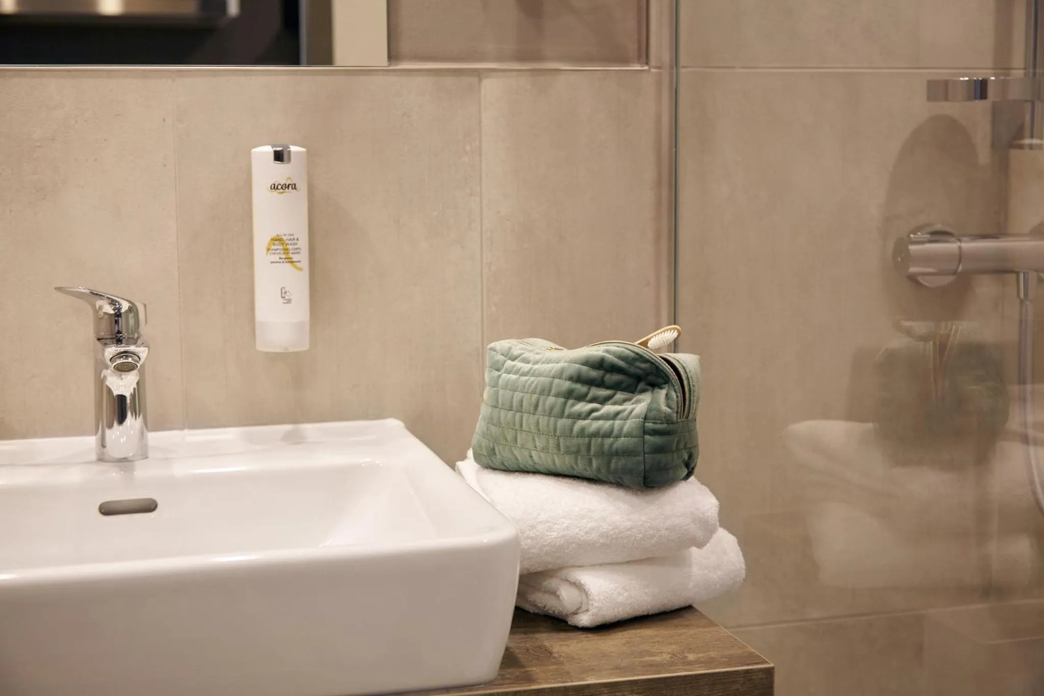 Bathroom in Candlewood Suites Düsseldorf Airport by IHG