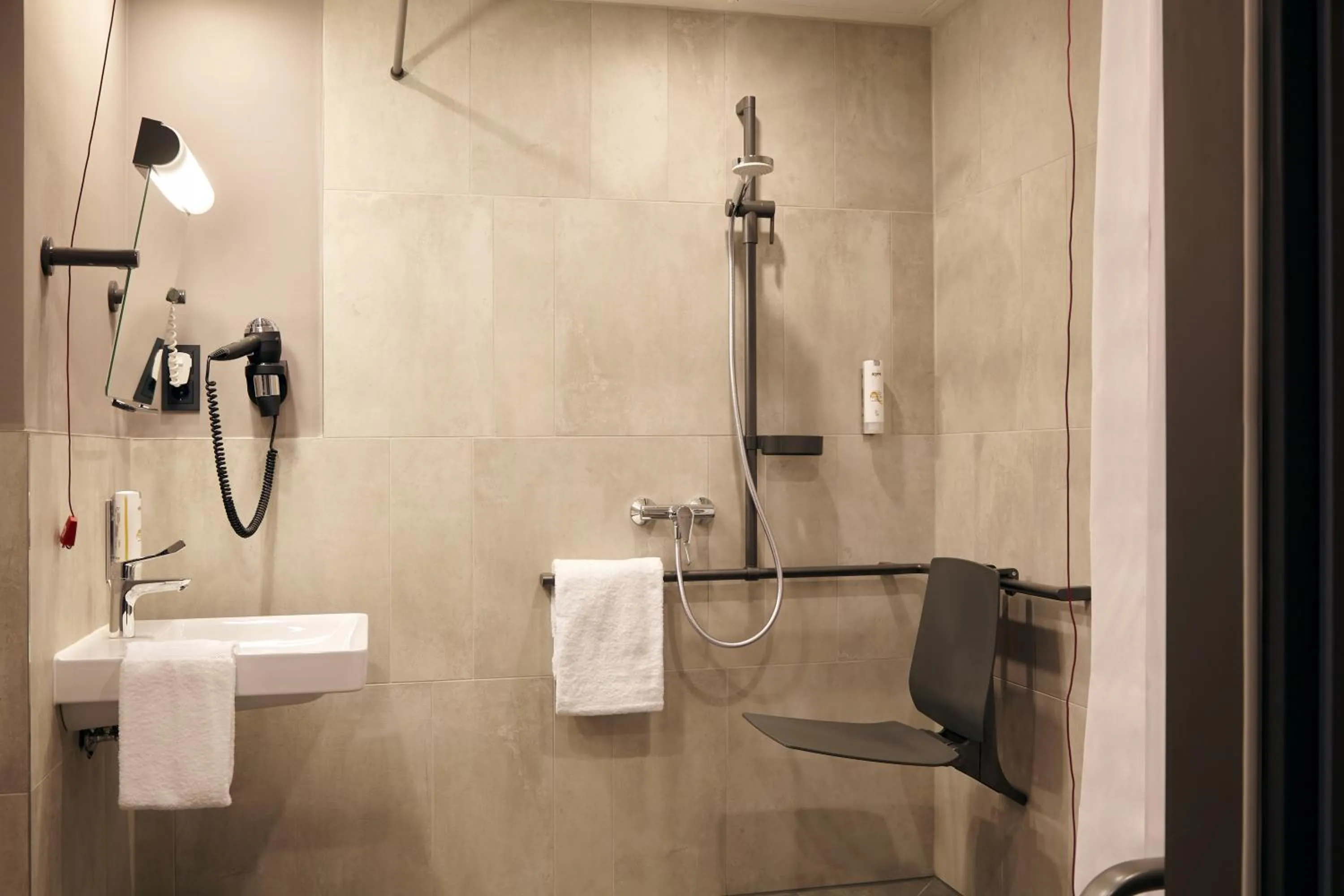 Shower in Candlewood Suites Düsseldorf Airport by IHG