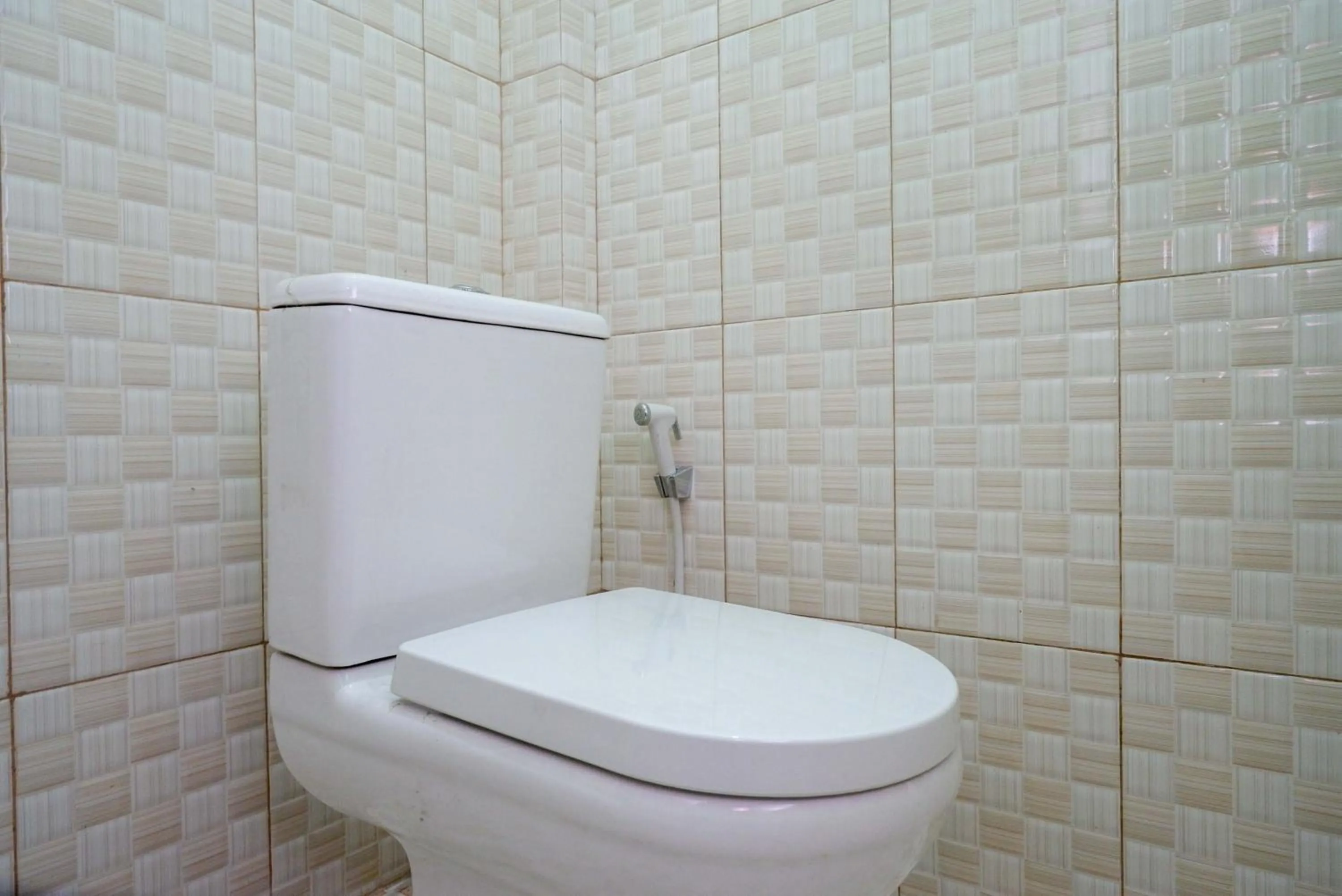 Bathroom in RedDoorz Syariah near Monumen Jogja Kembali