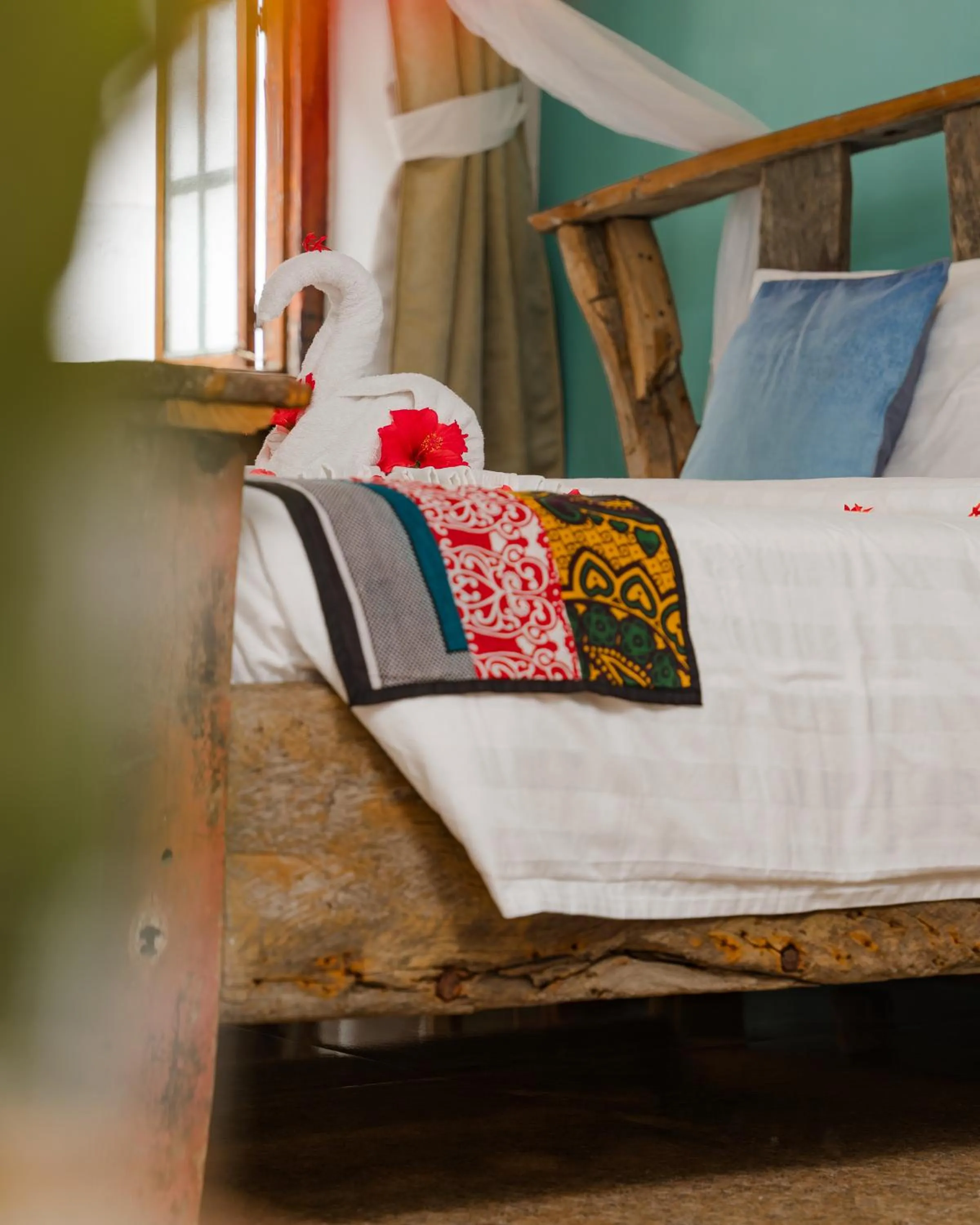 Bed in Emerald Palm Courtyard Hotel