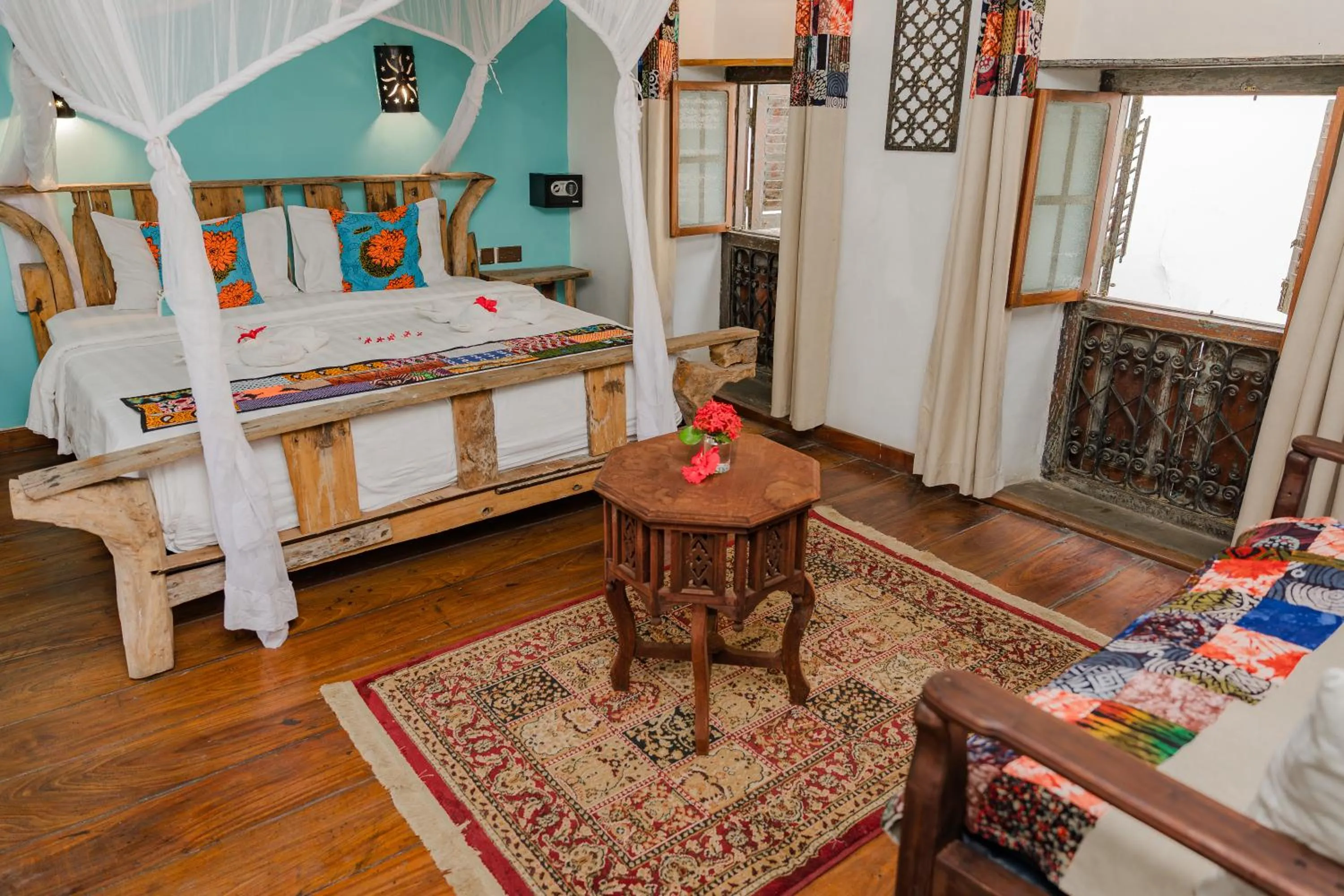 Bed in Emerald Palm Courtyard Hotel