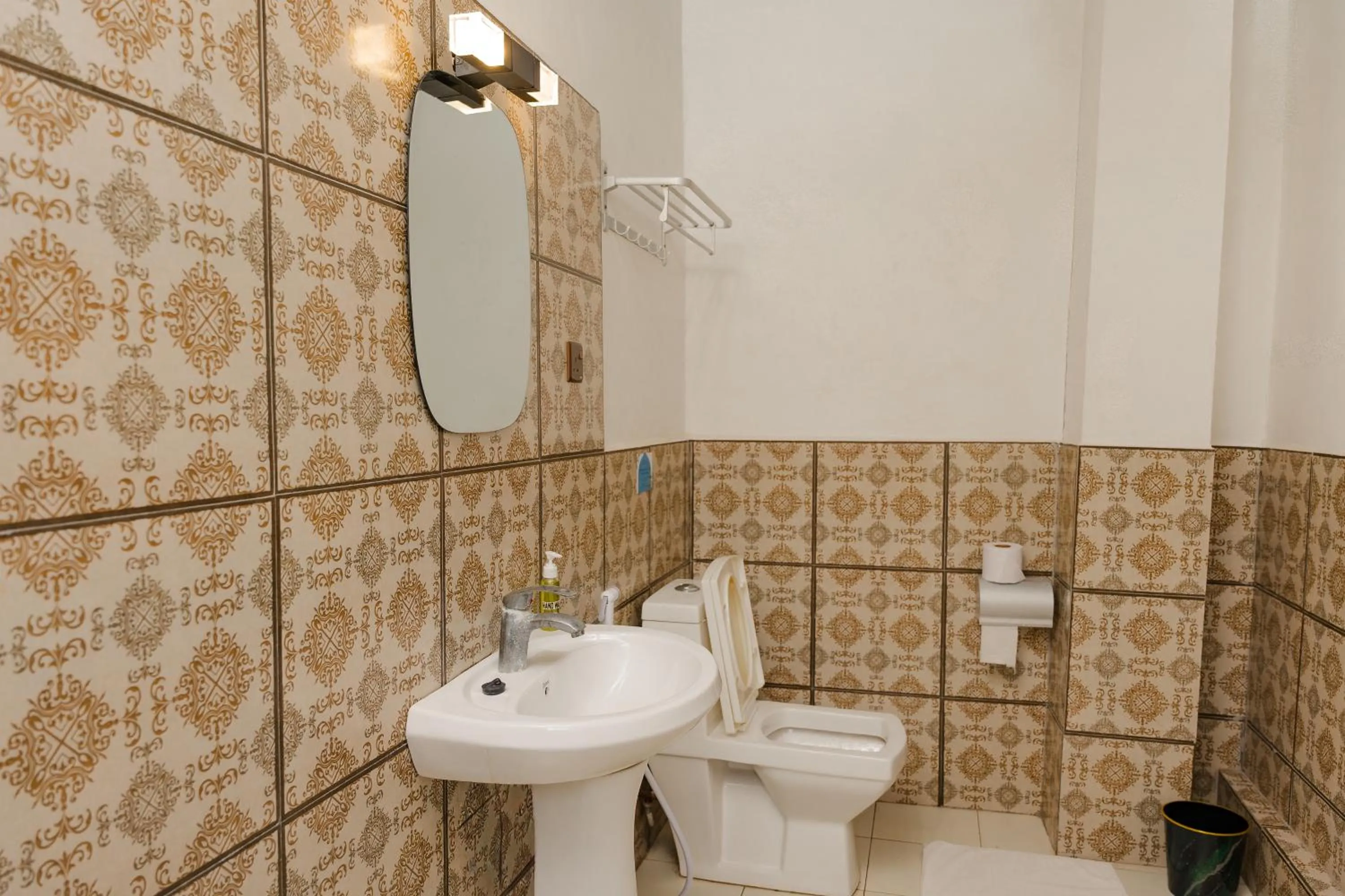 Shower in Emerald Palm Courtyard Hotel