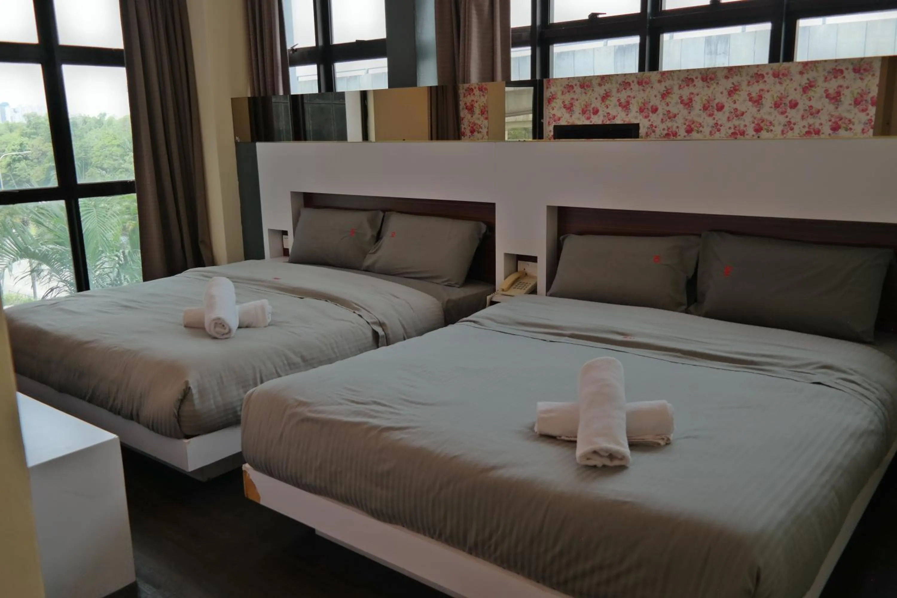 Bed in Summer Oscar Boutique Hotel